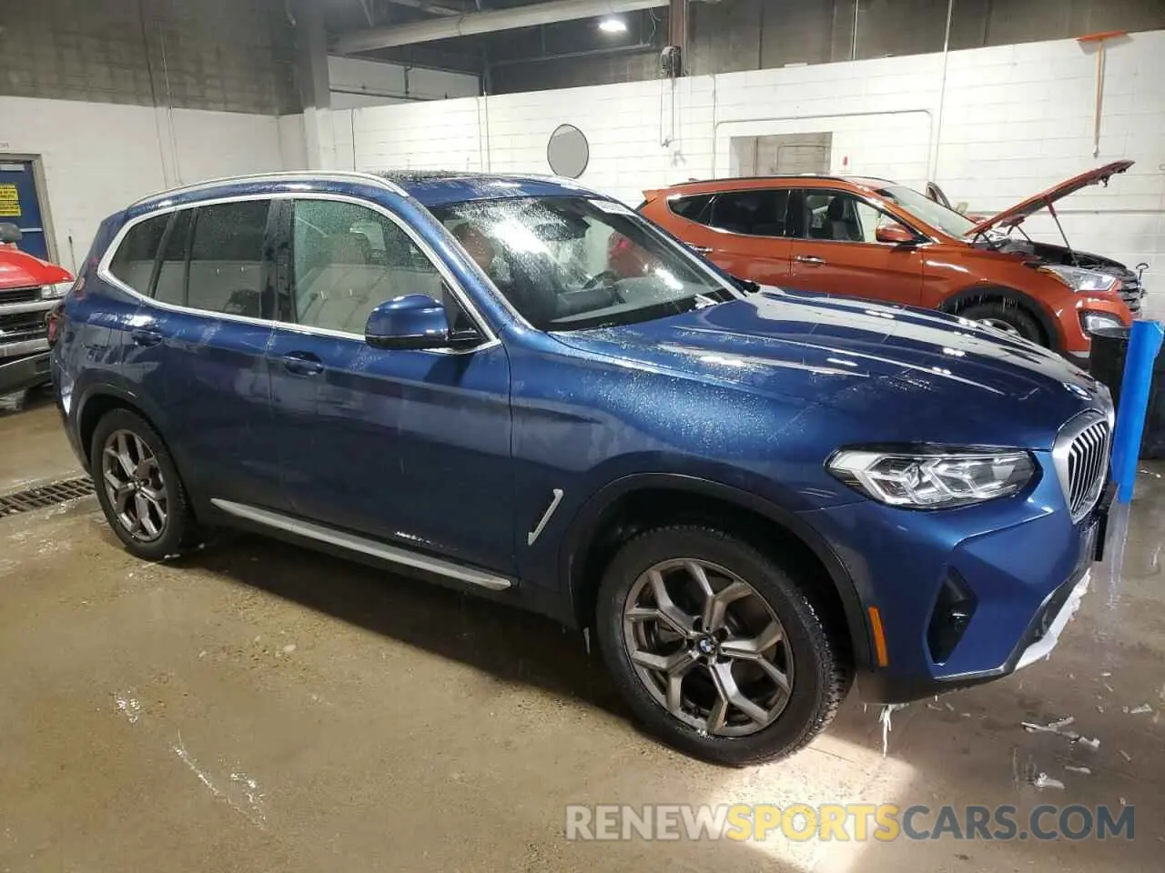 4 Photograph of a damaged car 5UX53DP09N9J89405 BMW X3 2022