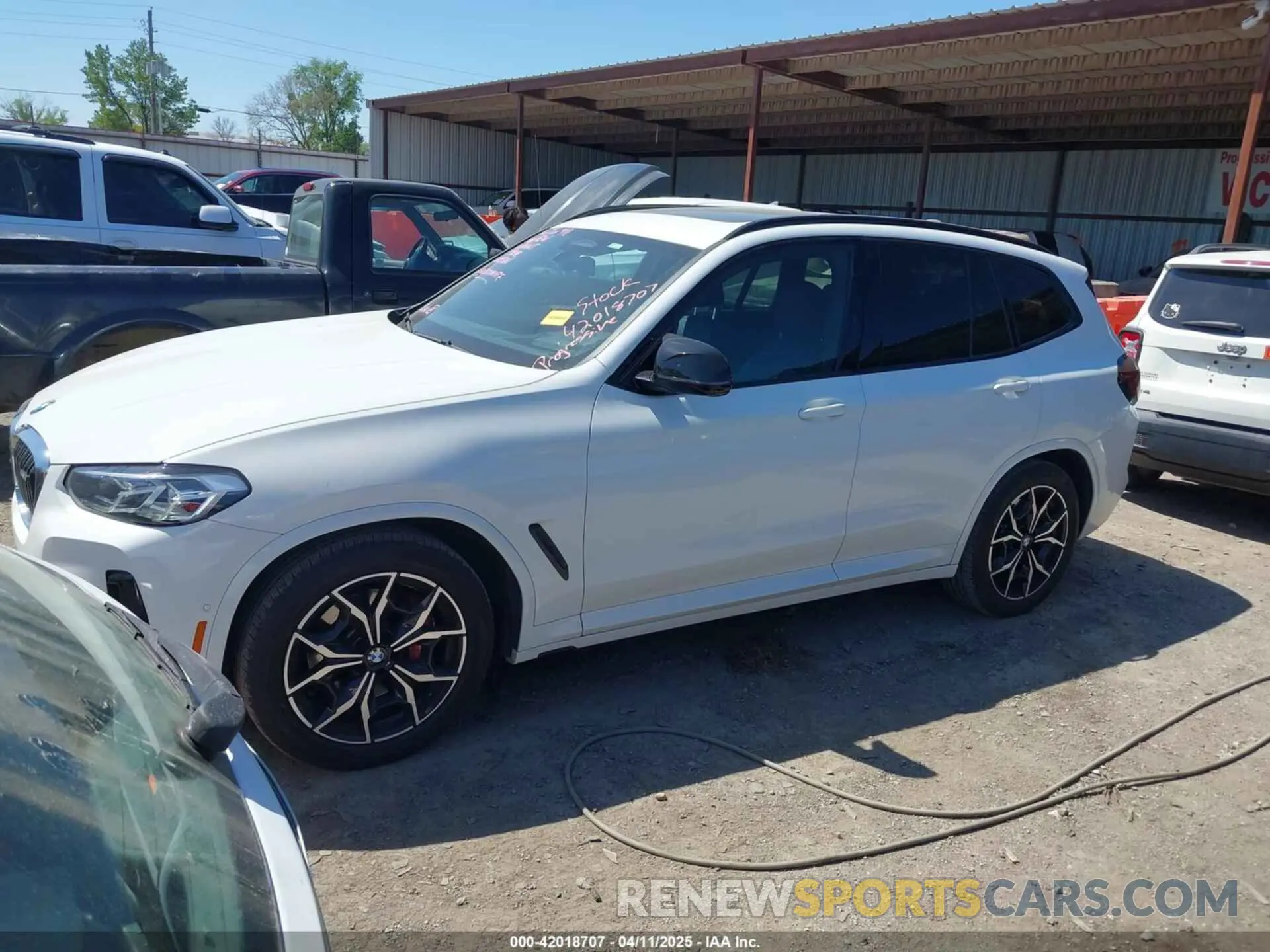 21 Photograph of a damaged car 5UX83DP06N9K87661 BMW X3 2022