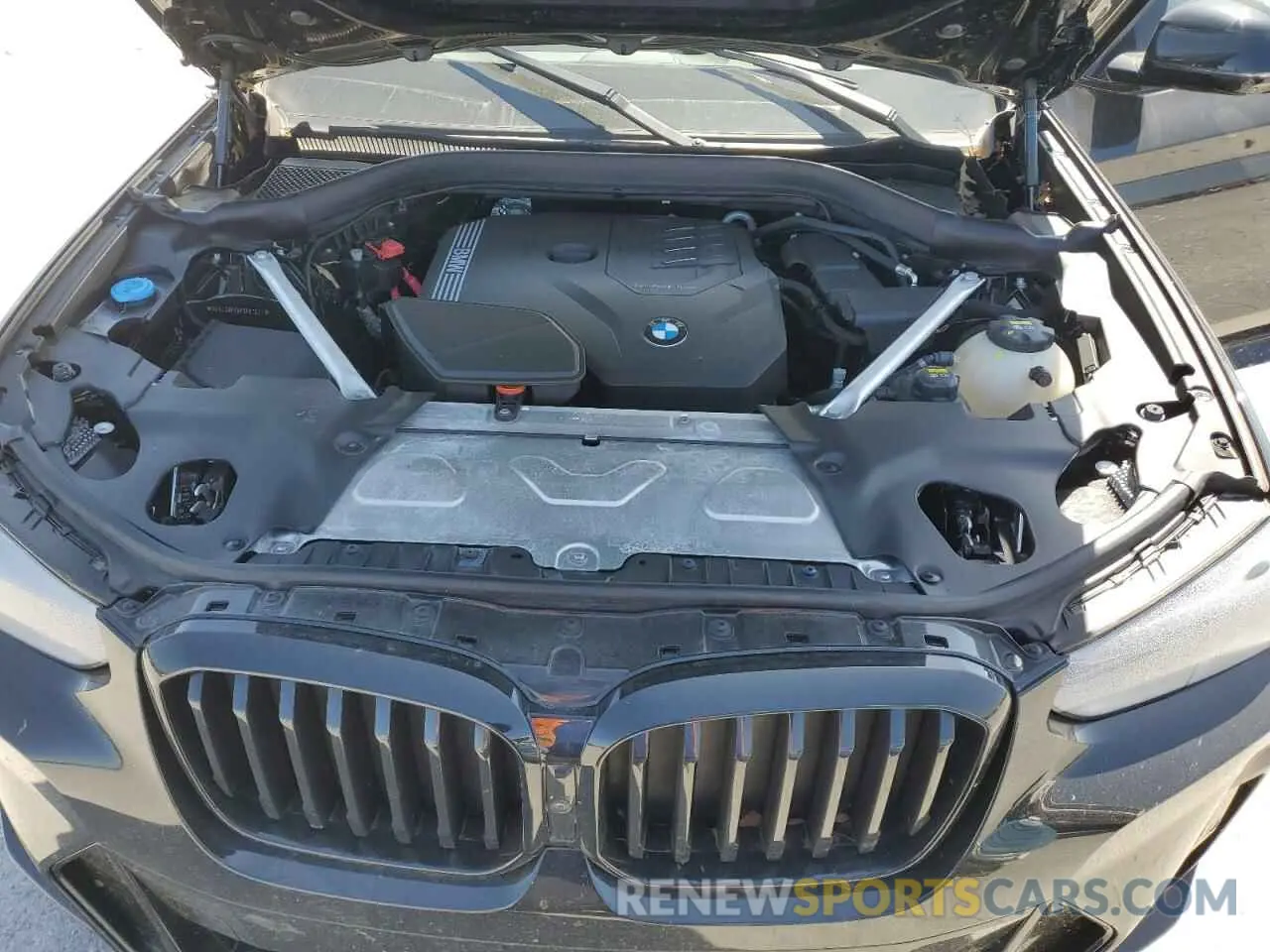 12 Photograph of a damaged car 5UX43DP05P9P87523 BMW X3 2023