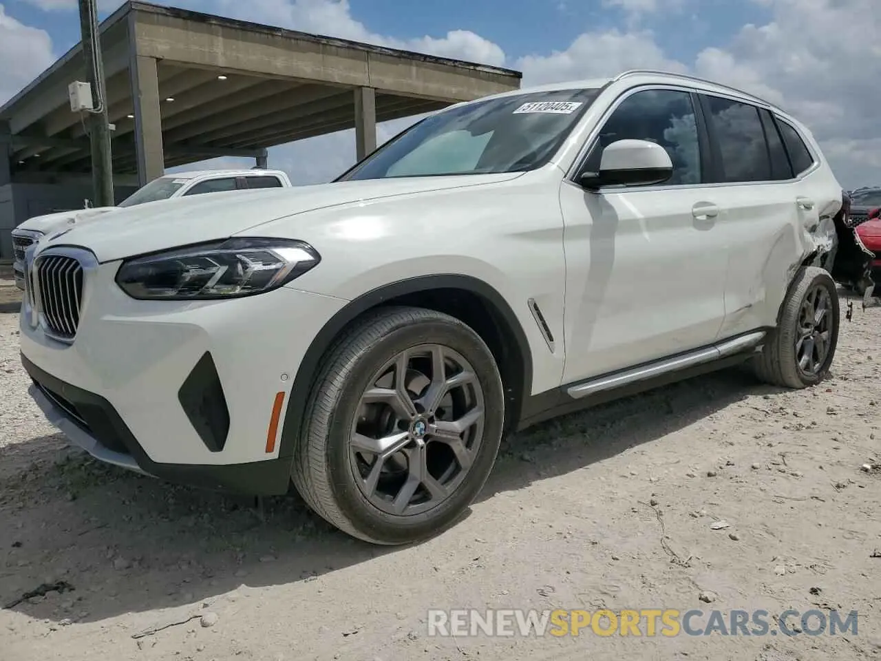 1 Photograph of a damaged car 5UX43DP06P9T04654 BMW X3 2023