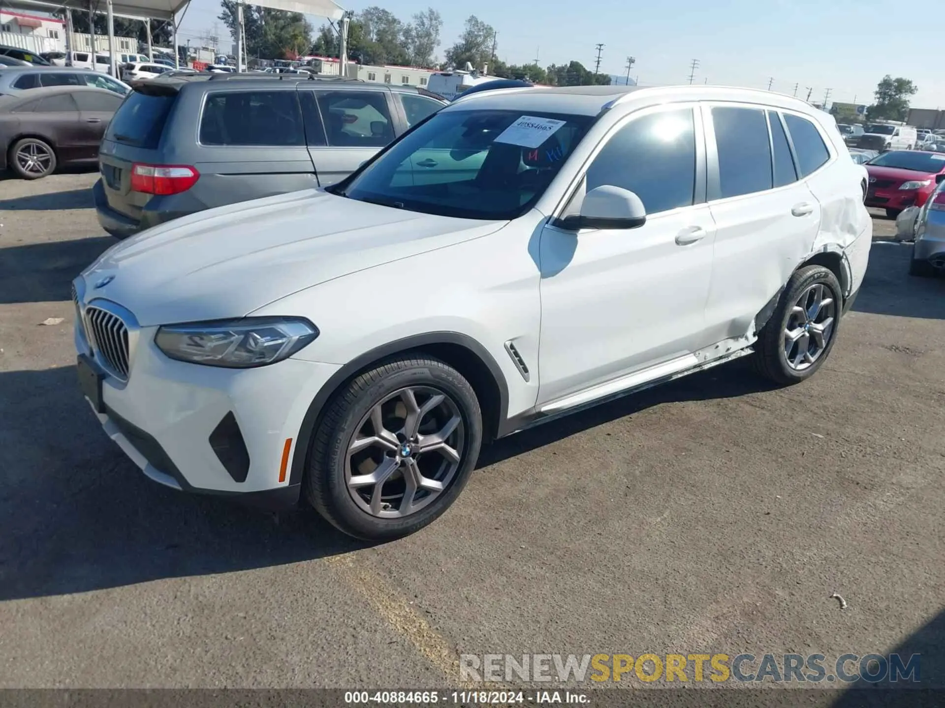2 Photograph of a damaged car 5UX43DP07P9N54744 BMW X3 2023