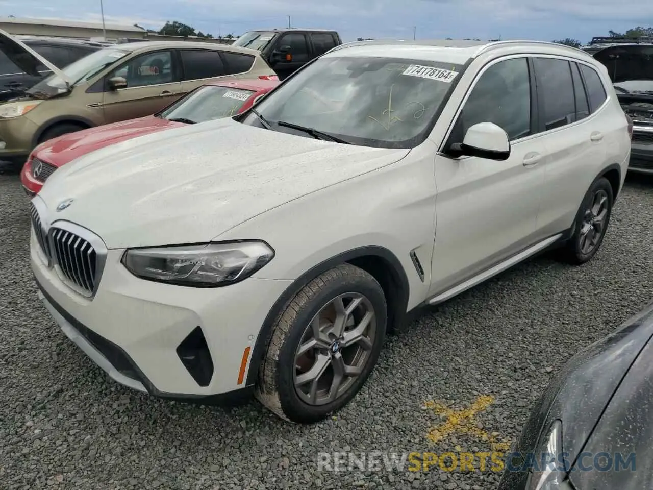 1 Photograph of a damaged car 5UX43DP08P9S90109 BMW X3 2023