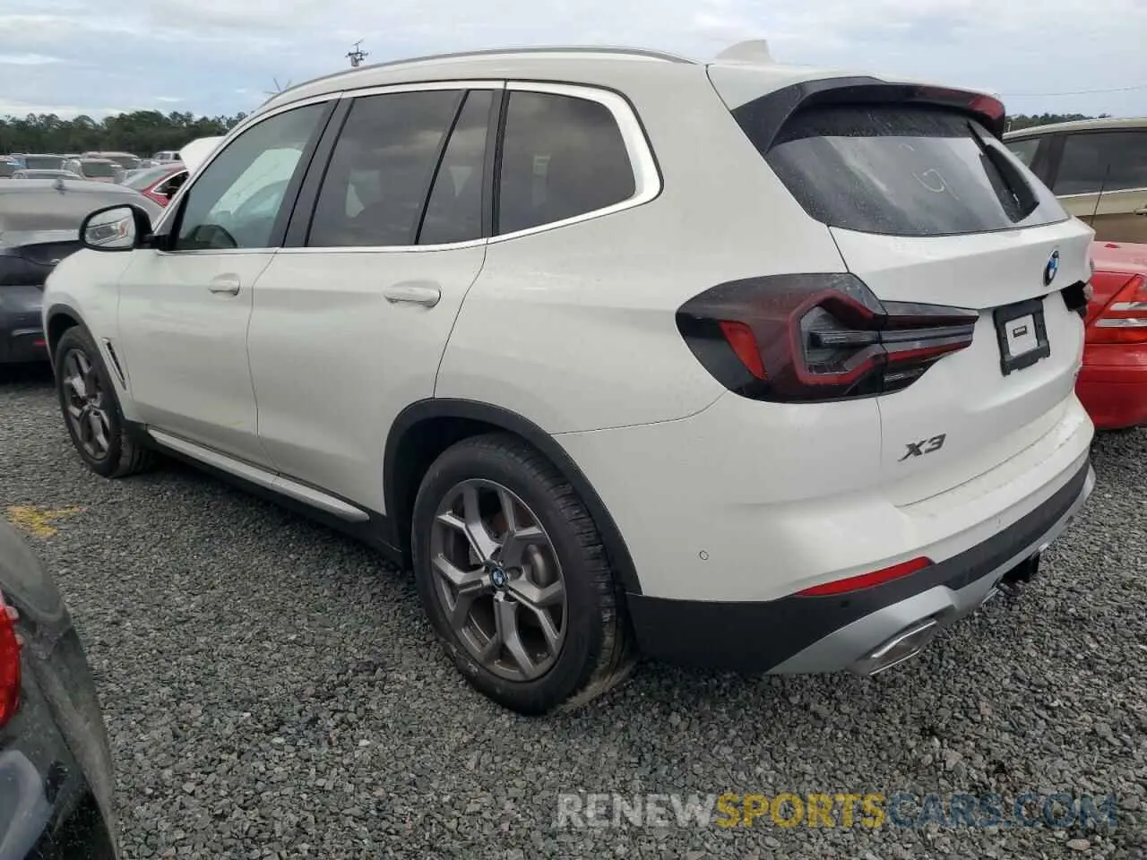 2 Photograph of a damaged car 5UX43DP08P9S90109 BMW X3 2023
