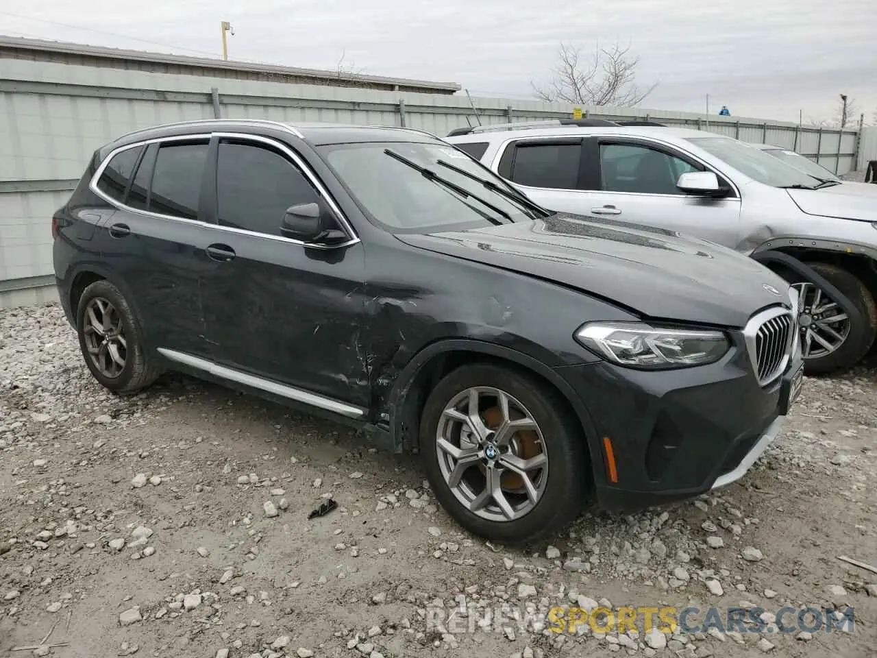 4 Photograph of a damaged car 5UX53DP04P9N51157 BMW X3 2023