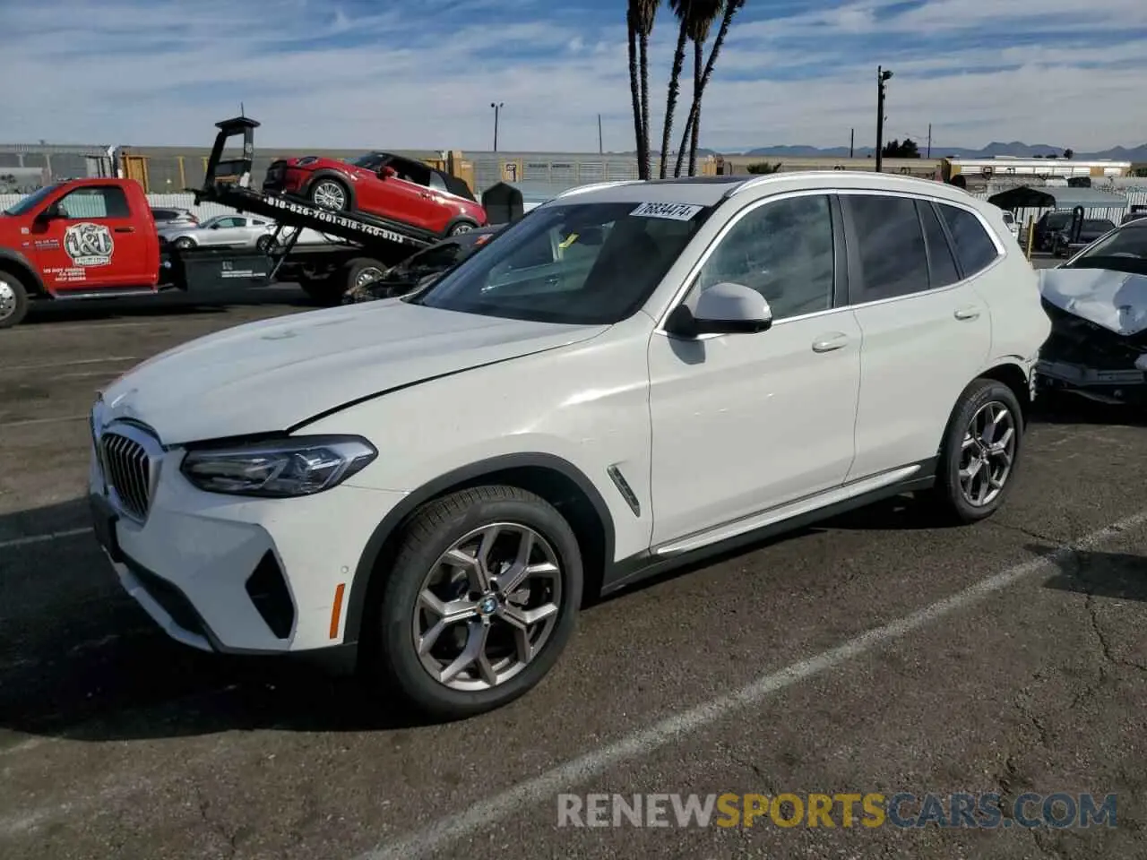 1 Photograph of a damaged car 5UX53DP04P9P09691 BMW X3 2023