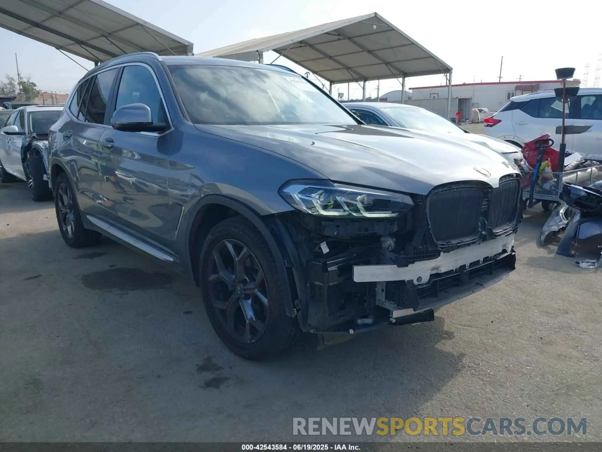 1 Photograph of a damaged car 5UX53DP06P9R51057 BMW X3 2023