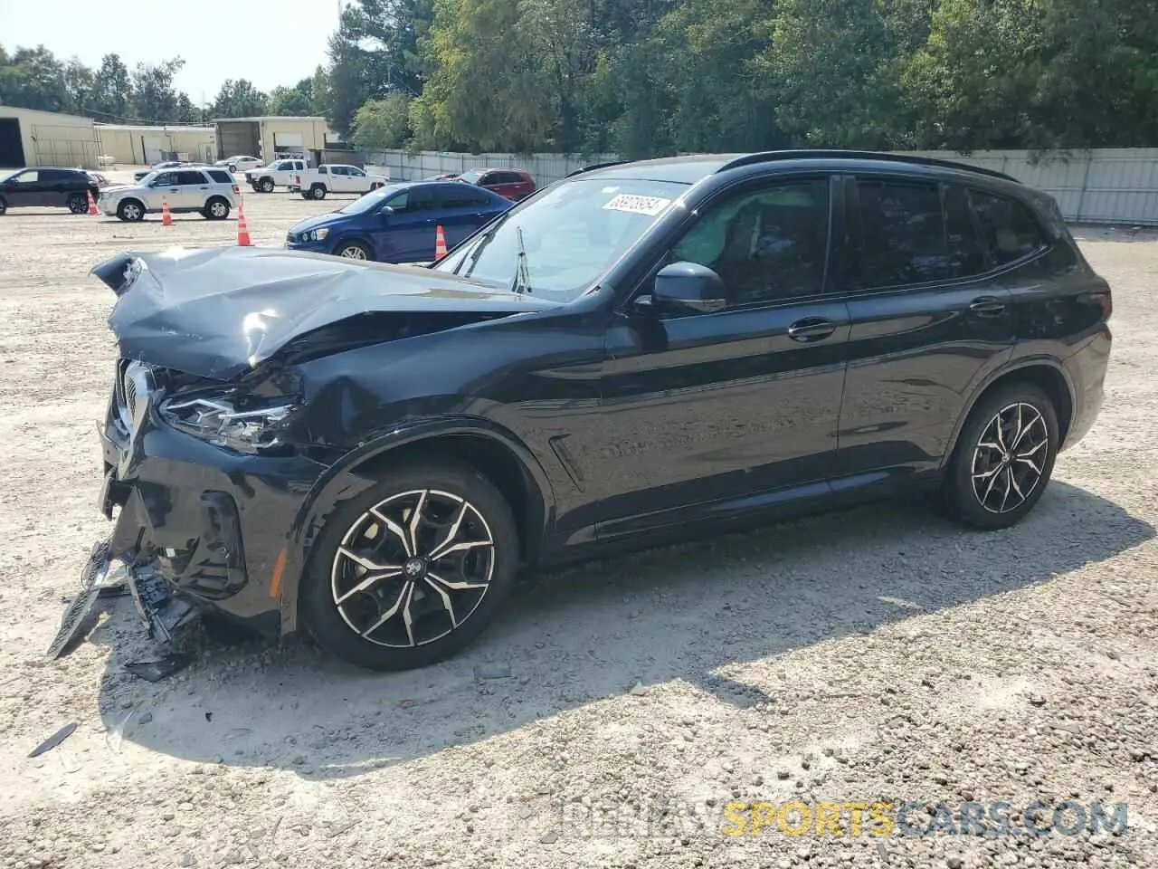 1 Photograph of a damaged car 5UX53DP08P9N60296 BMW X3 2023