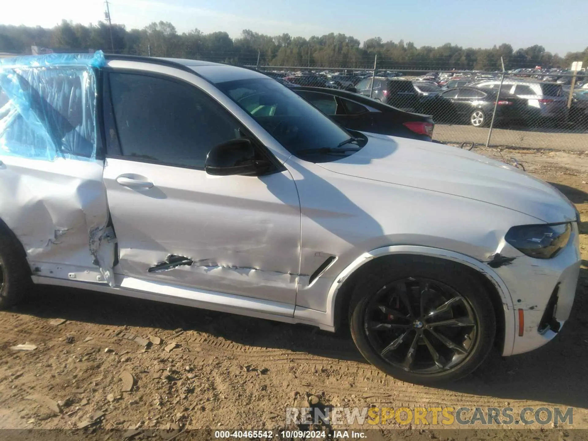 6 Photograph of a damaged car 5UX83DP05P9N51939 BMW X3 2023
