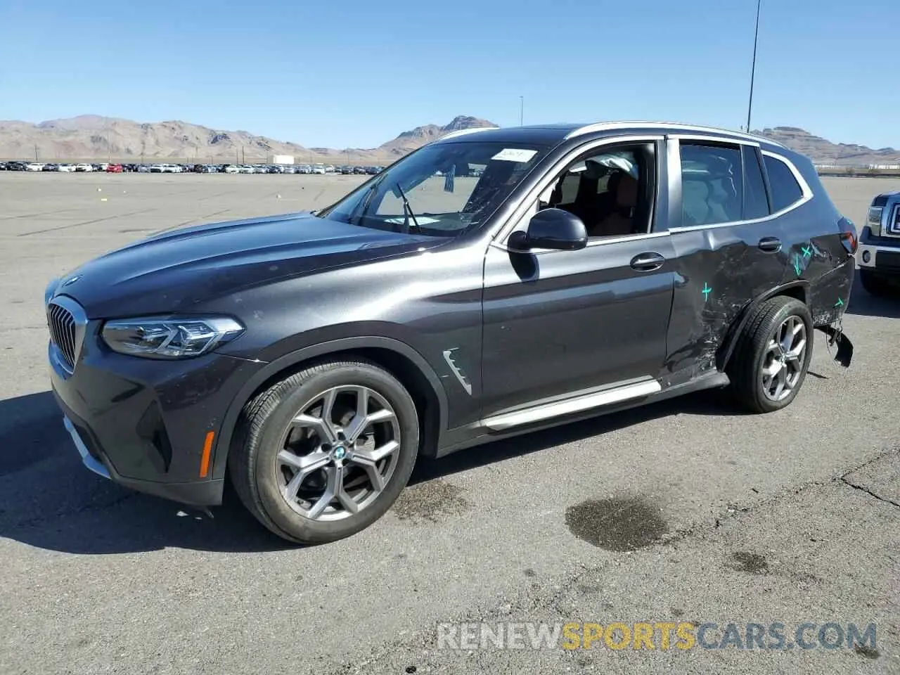 1 Photograph of a damaged car 5UX43DP00R9V00382 BMW X3 2024