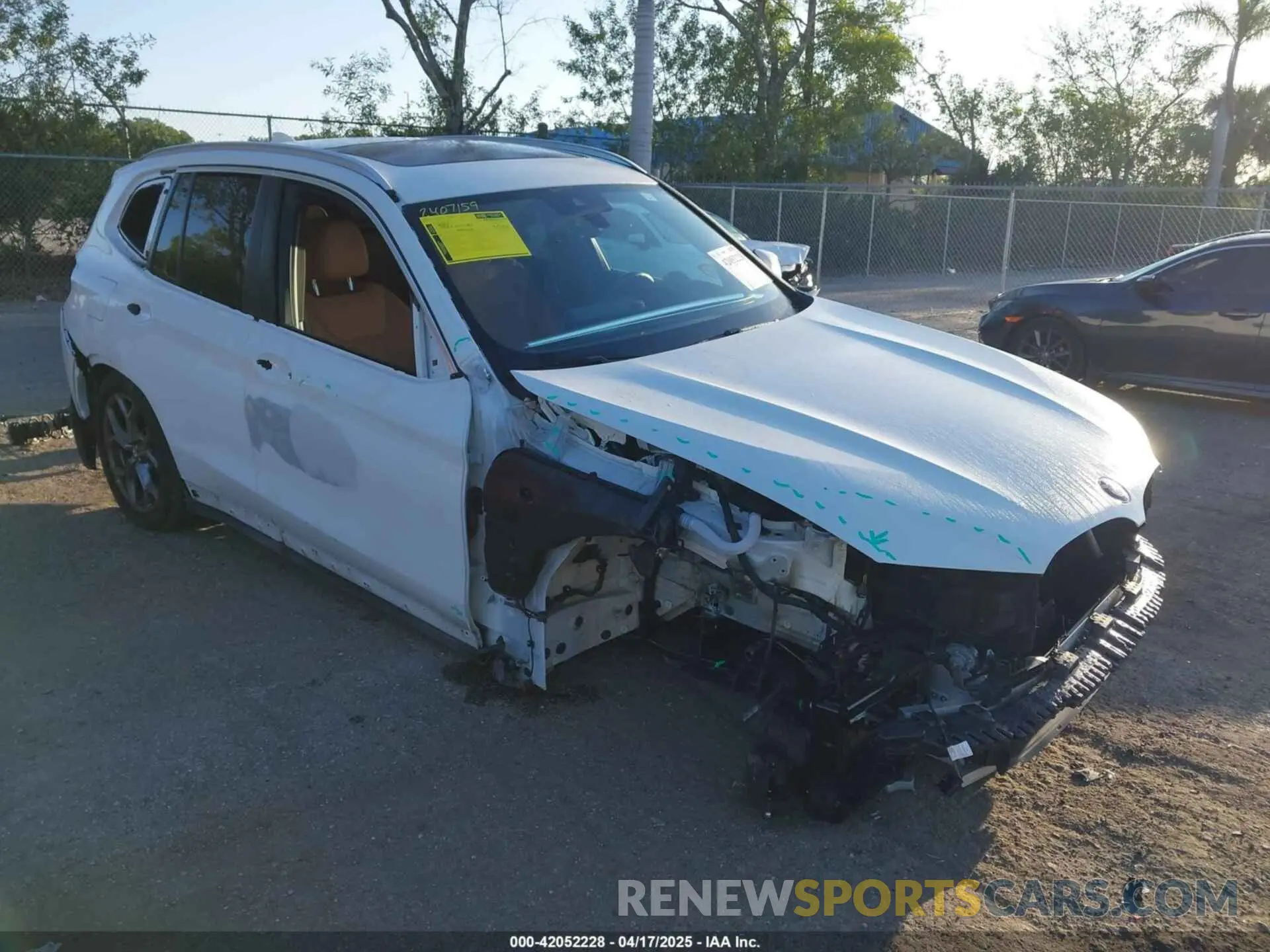 1 Photograph of a damaged car 5UX43DP02R9V01971 BMW X3 2024