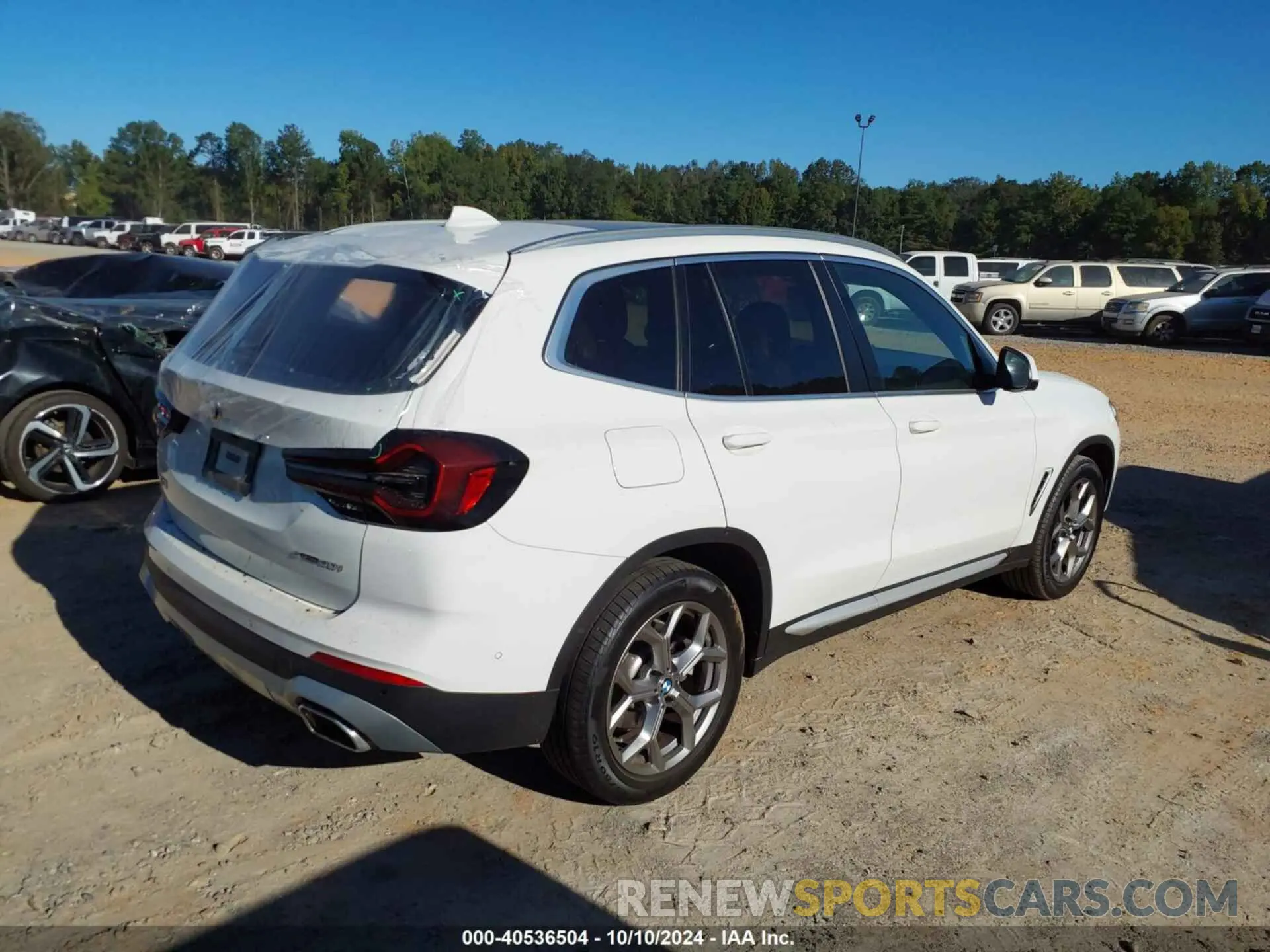 4 Photograph of a damaged car 5UX43DP04R9V93181 BMW X3 2024