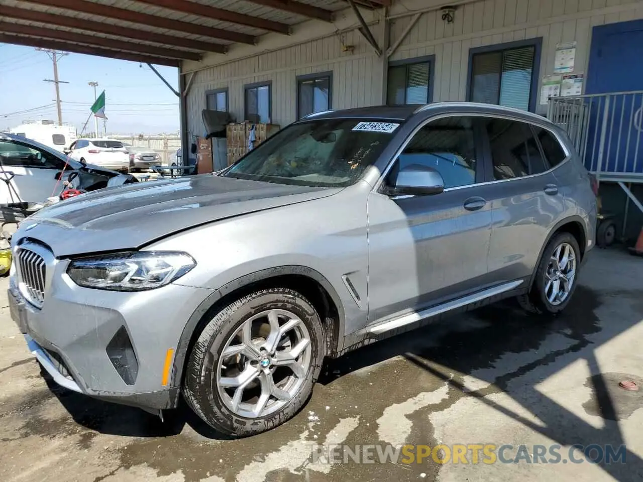 1 Photograph of a damaged car 5UX43DP07R9V34819 BMW X3 2024