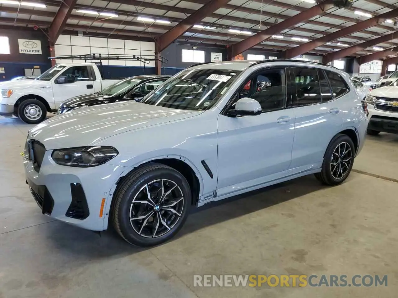 1 Photograph of a damaged car 5UX53DP07R9X26620 BMW X3 2024