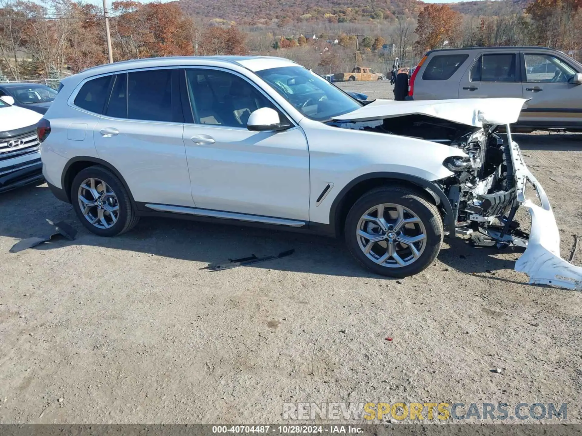 1 Photograph of a damaged car 5UX53DP09R9U81142 BMW X3 2024
