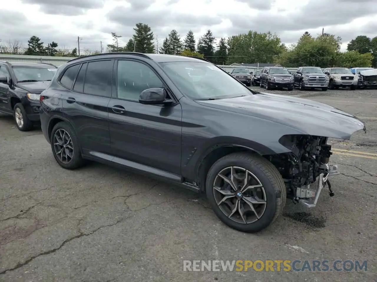 4 Photograph of a damaged car 5UX83DP04N9K80160 BMW X3 M40I 2022