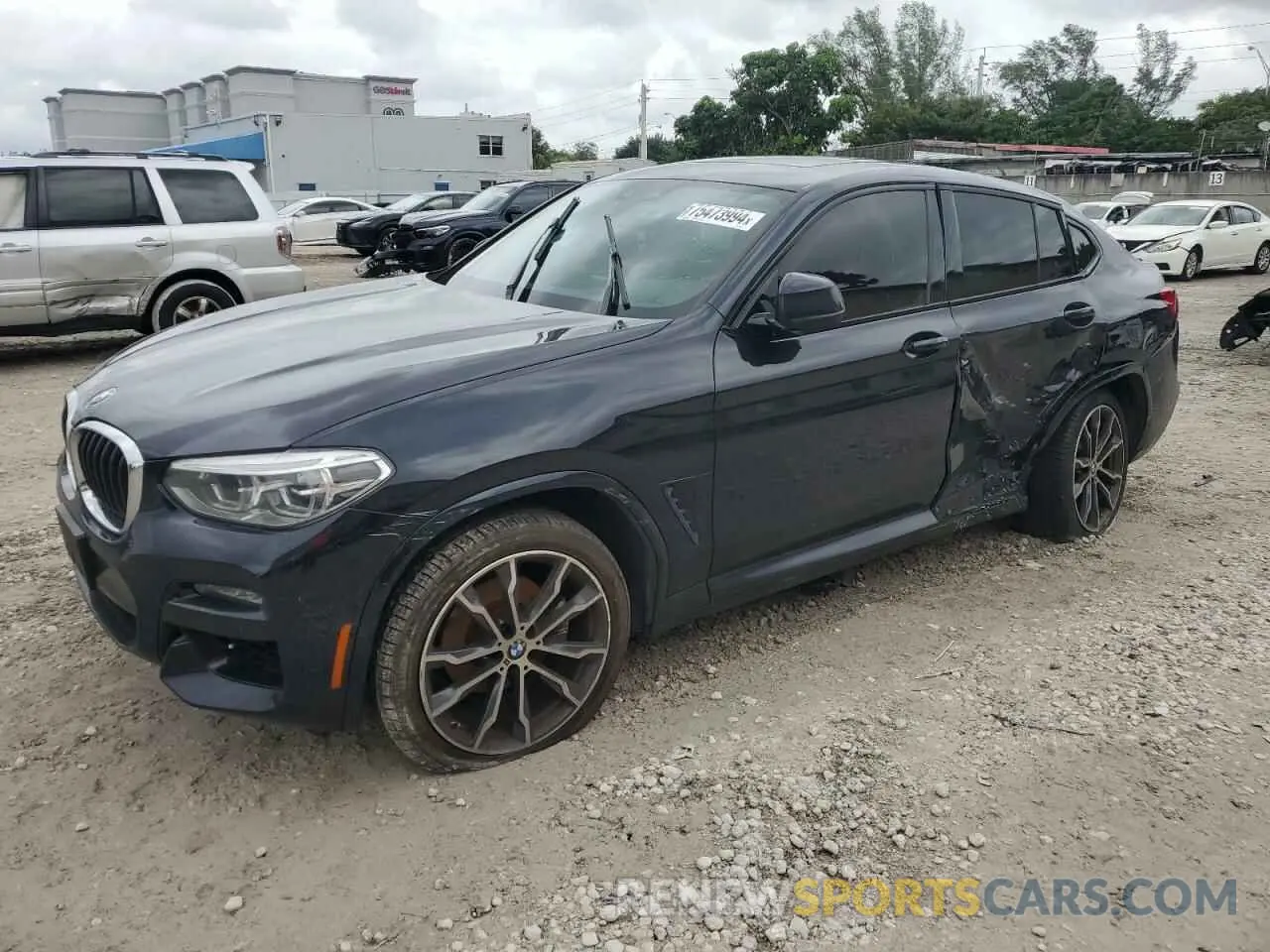 1 Photograph of a damaged car 5UX2V1C04M9F04579 BMW X4 2021