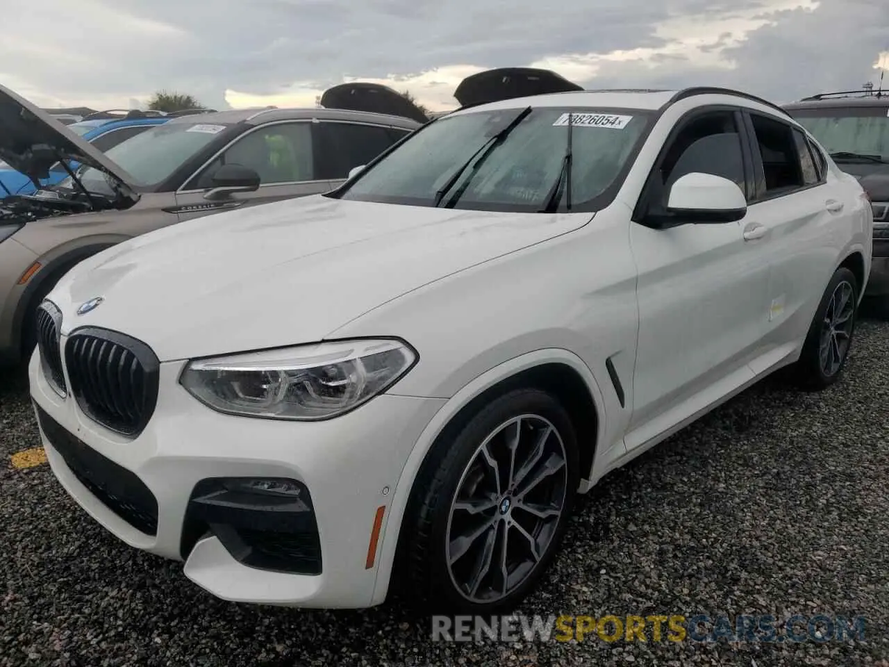 1 Photograph of a damaged car 5UX2V1C05M9H34647 BMW X4 2021