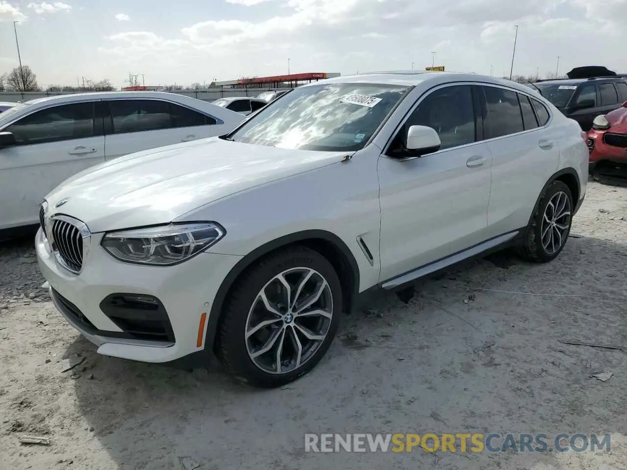 1 Photograph of a damaged car 5UX2V1C08M9G31058 BMW X4 2021