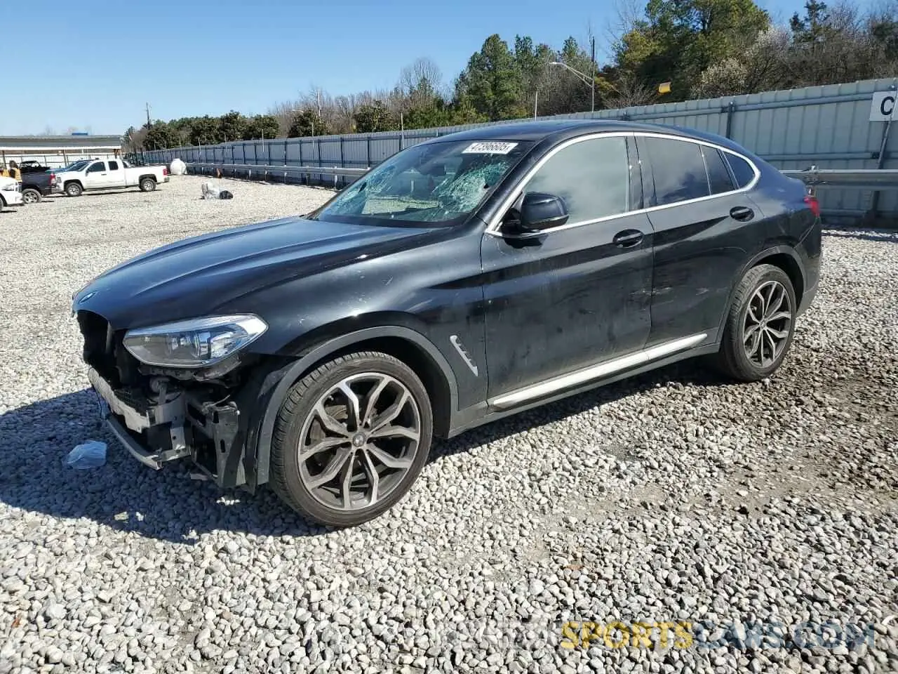 1 Photograph of a damaged car 5UX2V1C0XM9E74567 BMW X4 2021