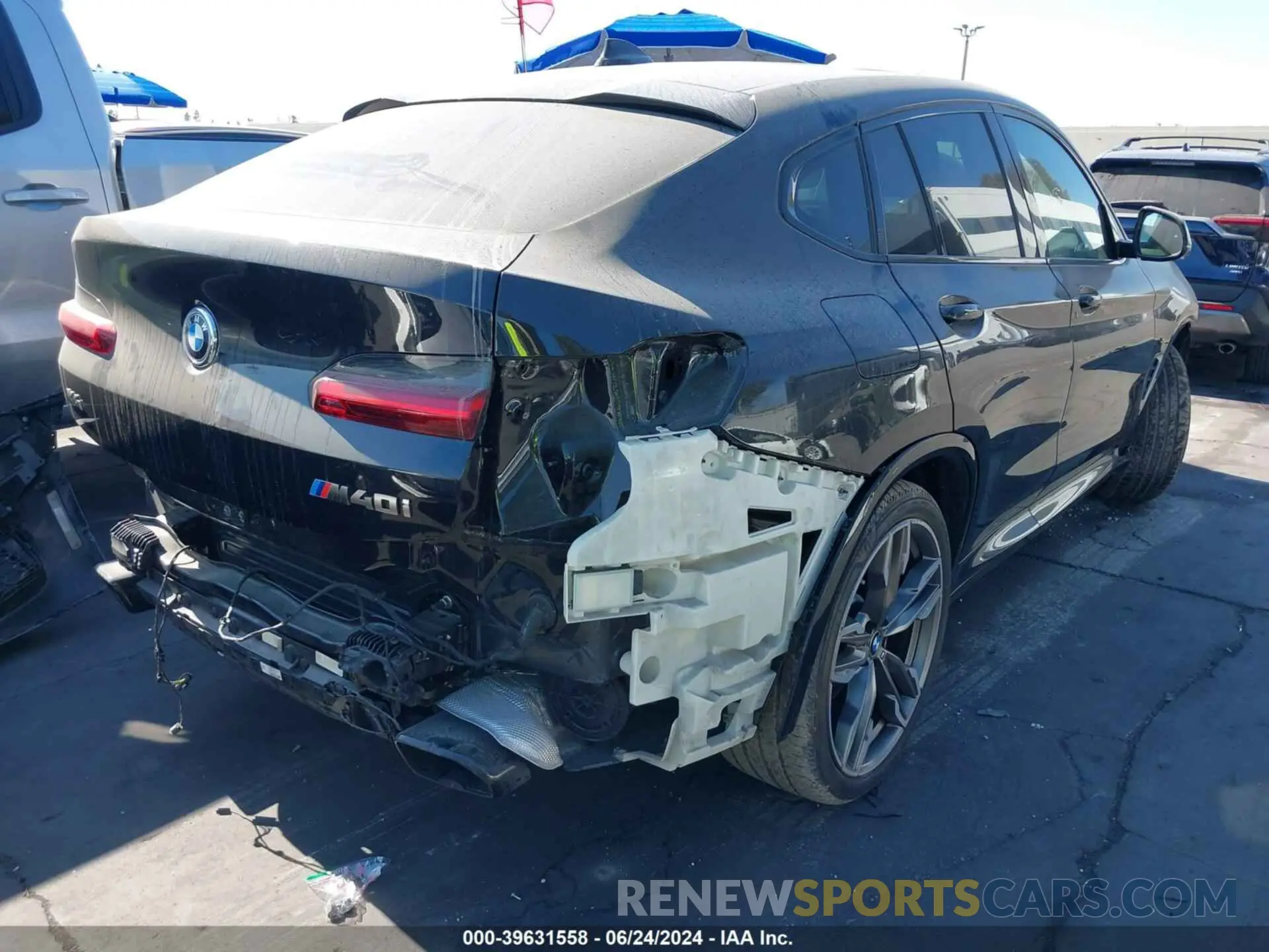 4 Photograph of a damaged car 5UX2V5C09M9E71182 BMW X4 2021