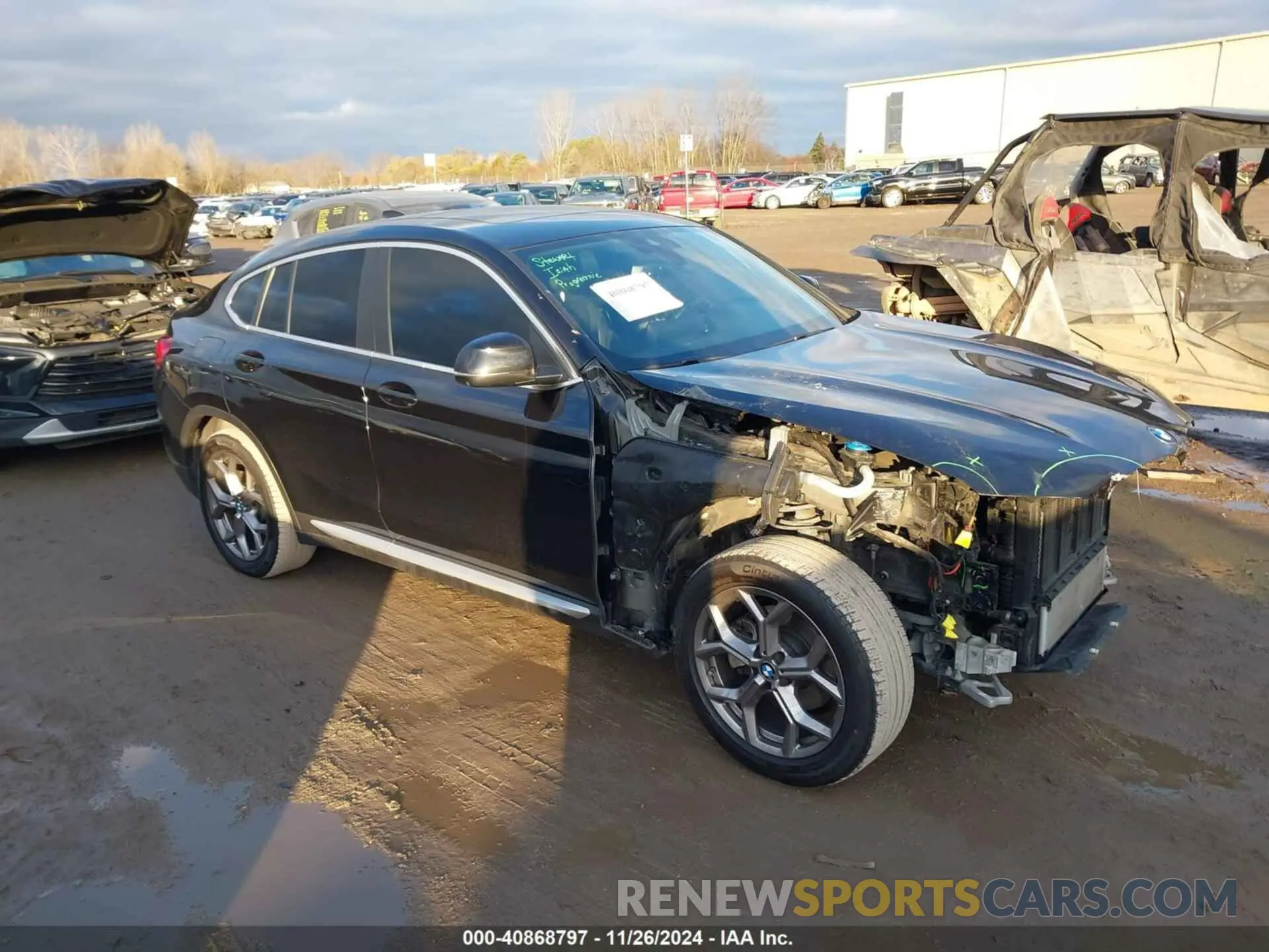1 Photograph of a damaged car 5UX33DT09N9J72309 BMW X4 2022