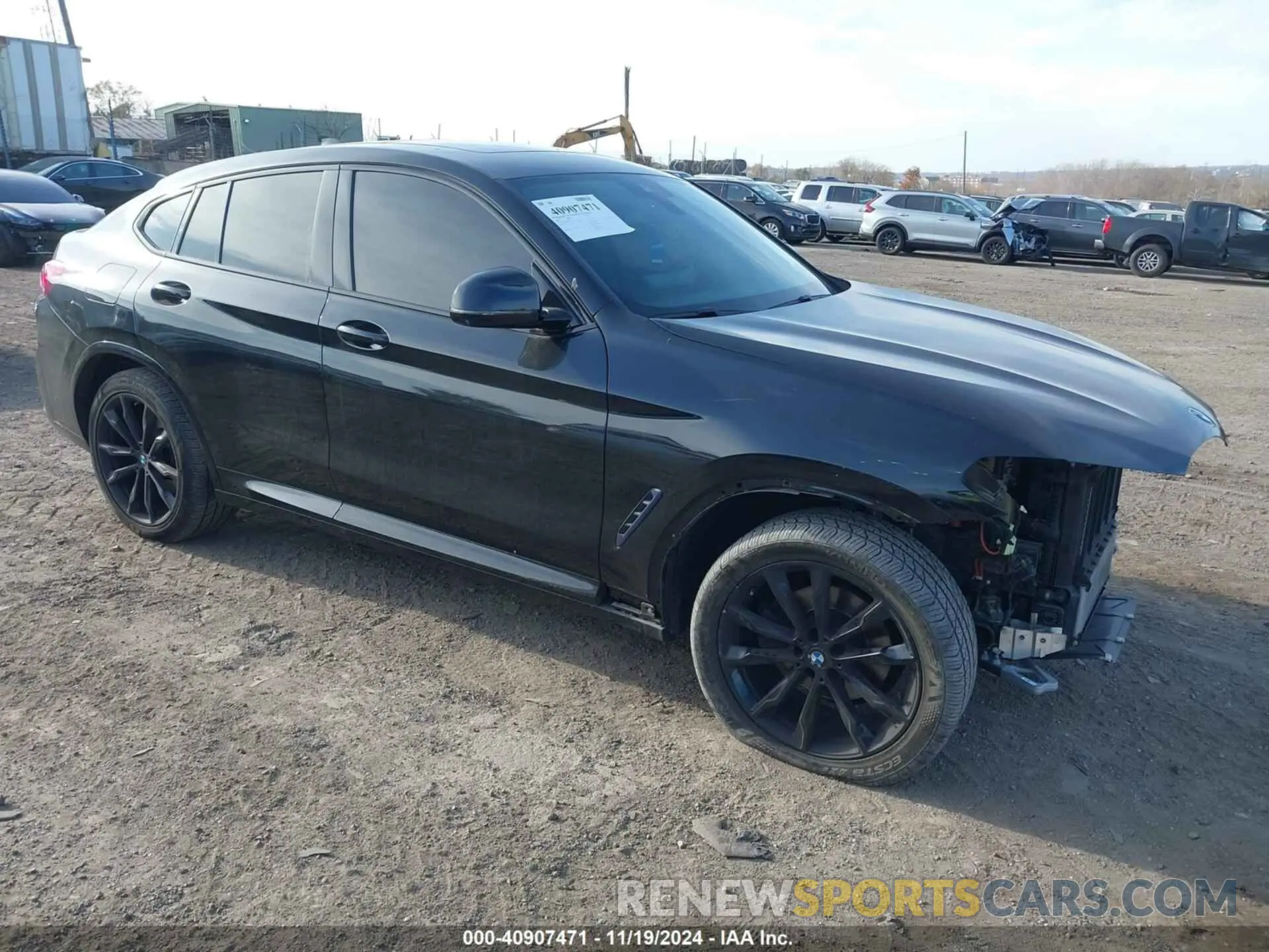 1 Photograph of a damaged car 5UX33DT0XN9L12528 BMW X4 2022