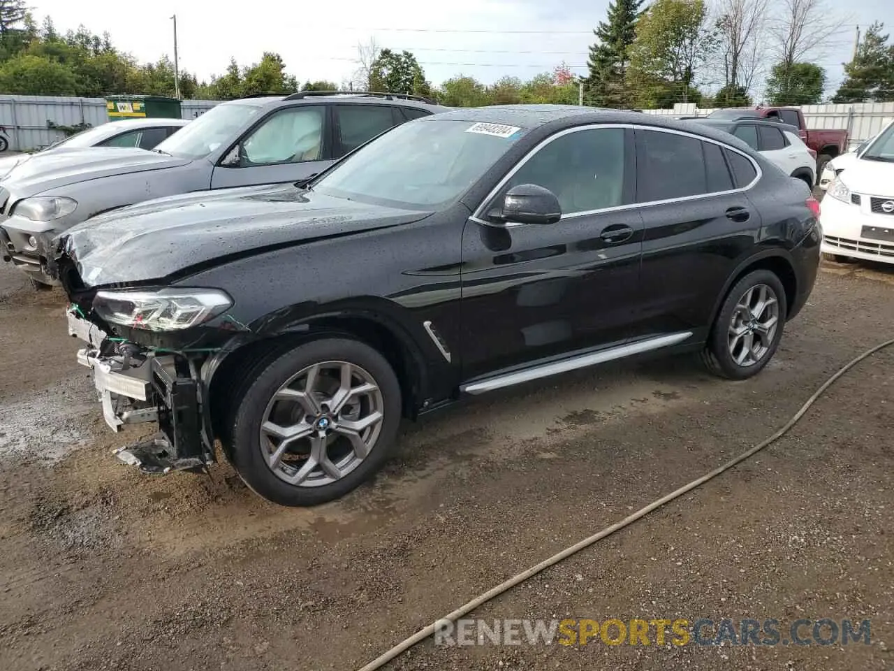 1 Photograph of a damaged car 5UX33DT03P9N51020 BMW X4 2023