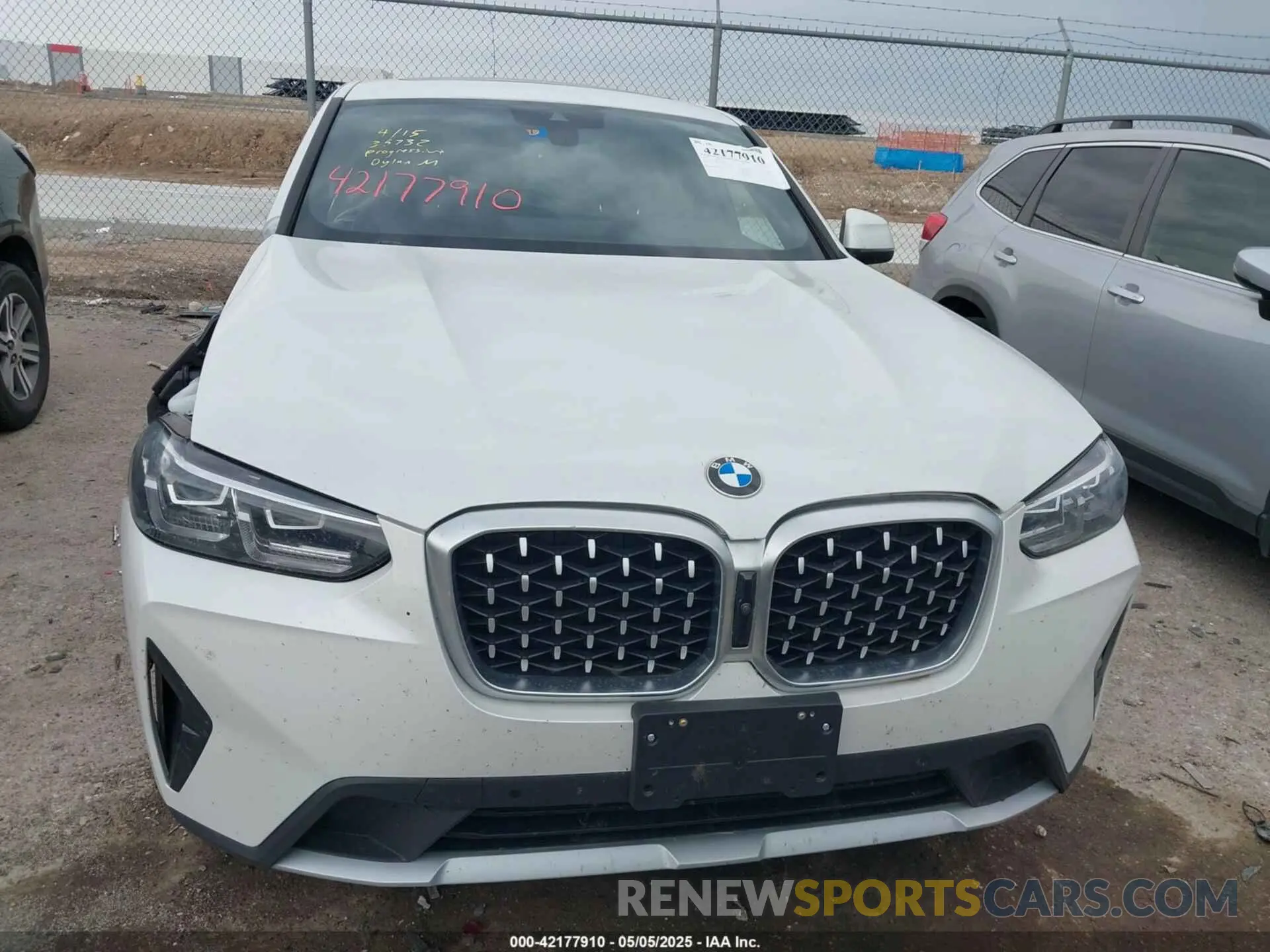 12 Photograph of a damaged car 5UX33DT08R9X21276 BMW X4 2024