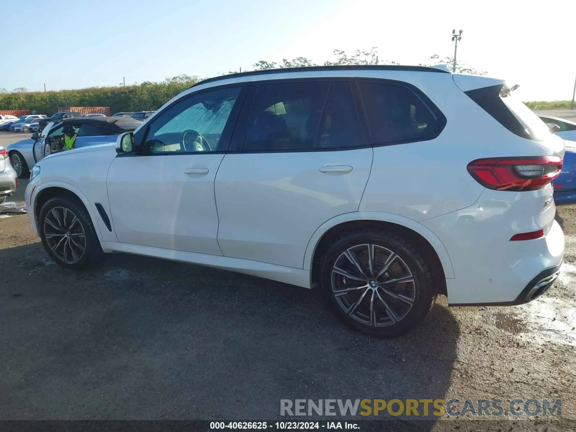 14 Photograph of a damaged car 5UXJU2C53KLN64947 BMW X5 2019