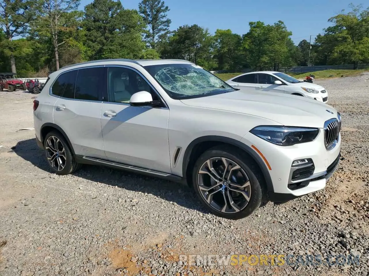 4 Photograph of a damaged car 5UXCR4C05M9H39972 BMW X5 2021
