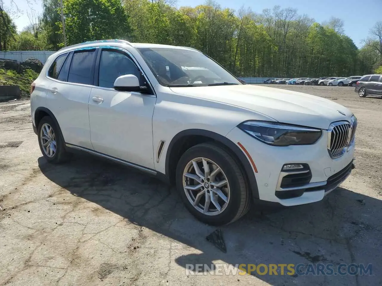 4 Photograph of a damaged car 5UXCR6C05M9F15709 BMW X5 2021
