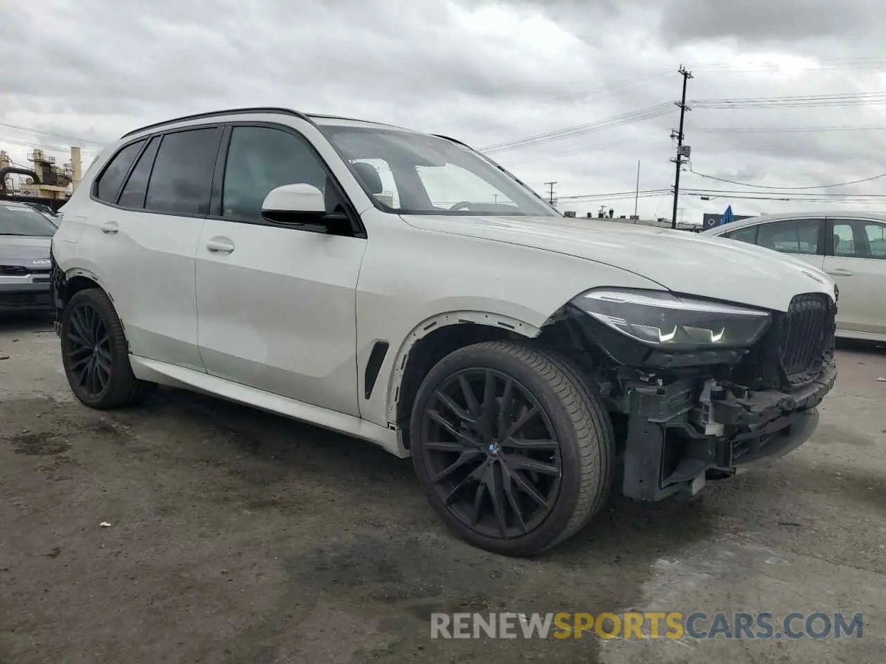 4 Photograph of a damaged car 5UXCR6C02P9P07428 BMW X5 2023