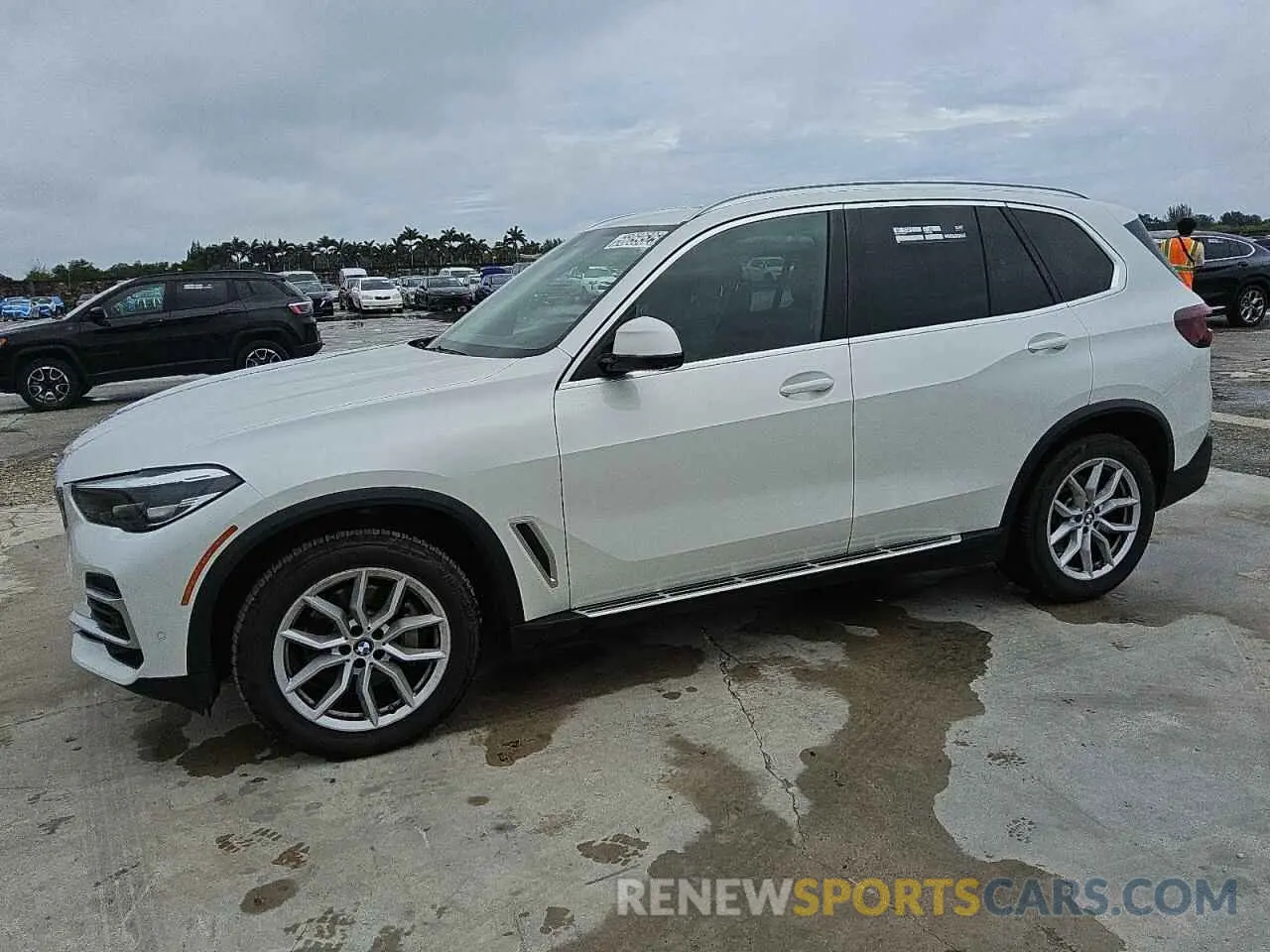 1 Photograph of a damaged car 5UXCR6C08P9P32642 BMW X5 2023