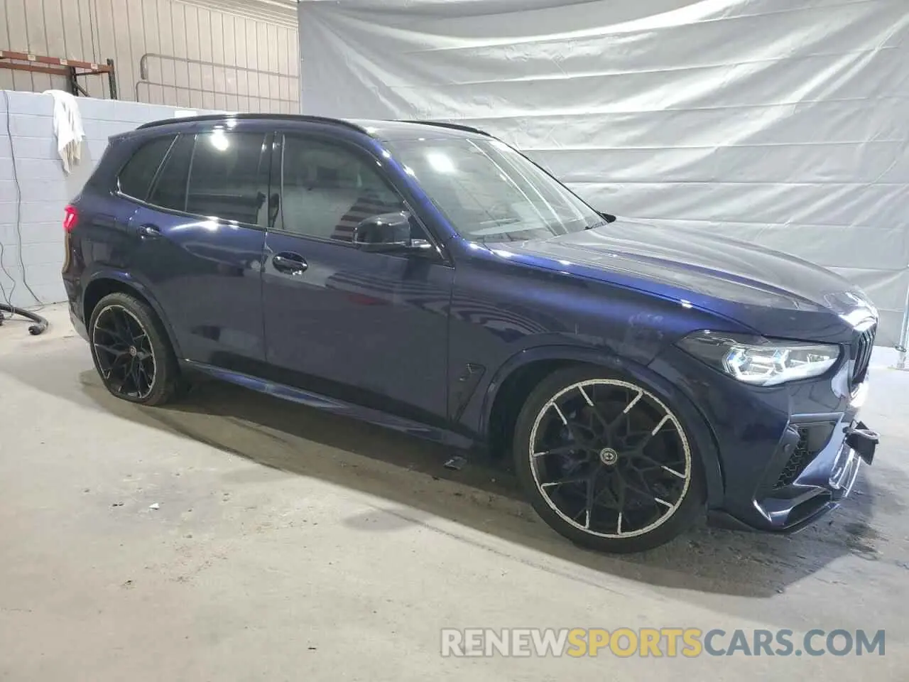 4 Photograph of a damaged car 5YMJU0C0XP9P85323 BMW X5 2023