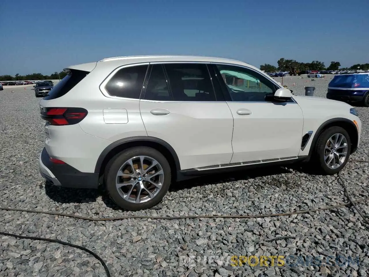 3 Photograph of a damaged car 5UX13EU03R9V56877 BMW X5 2024