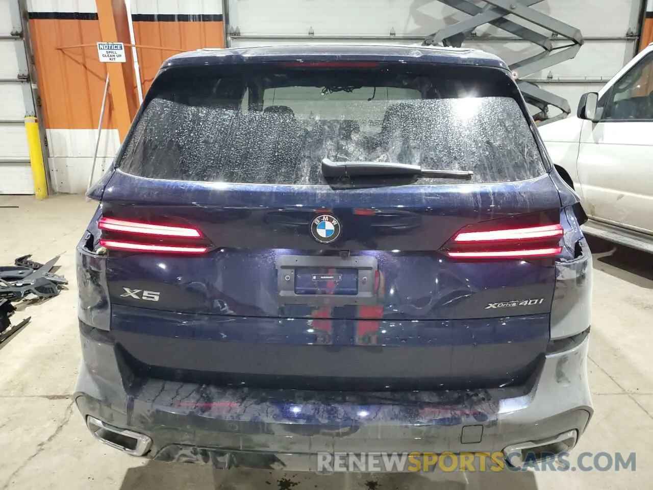6 Photograph of a damaged car 5UX23EU09R9U46078 BMW X5 2024