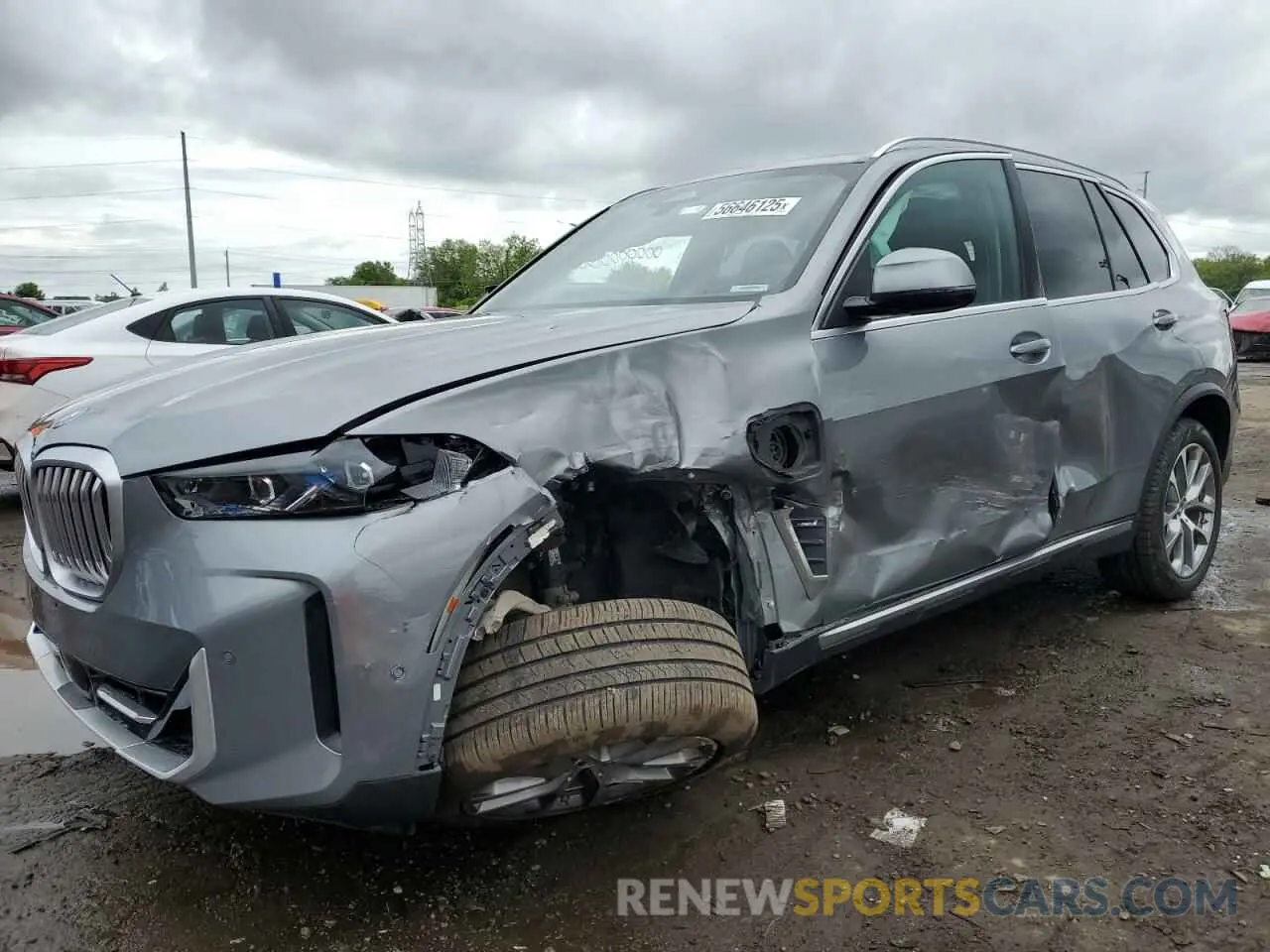 1 Photograph of a damaged car 5UX43EU09R9T80477 BMW X5 2024