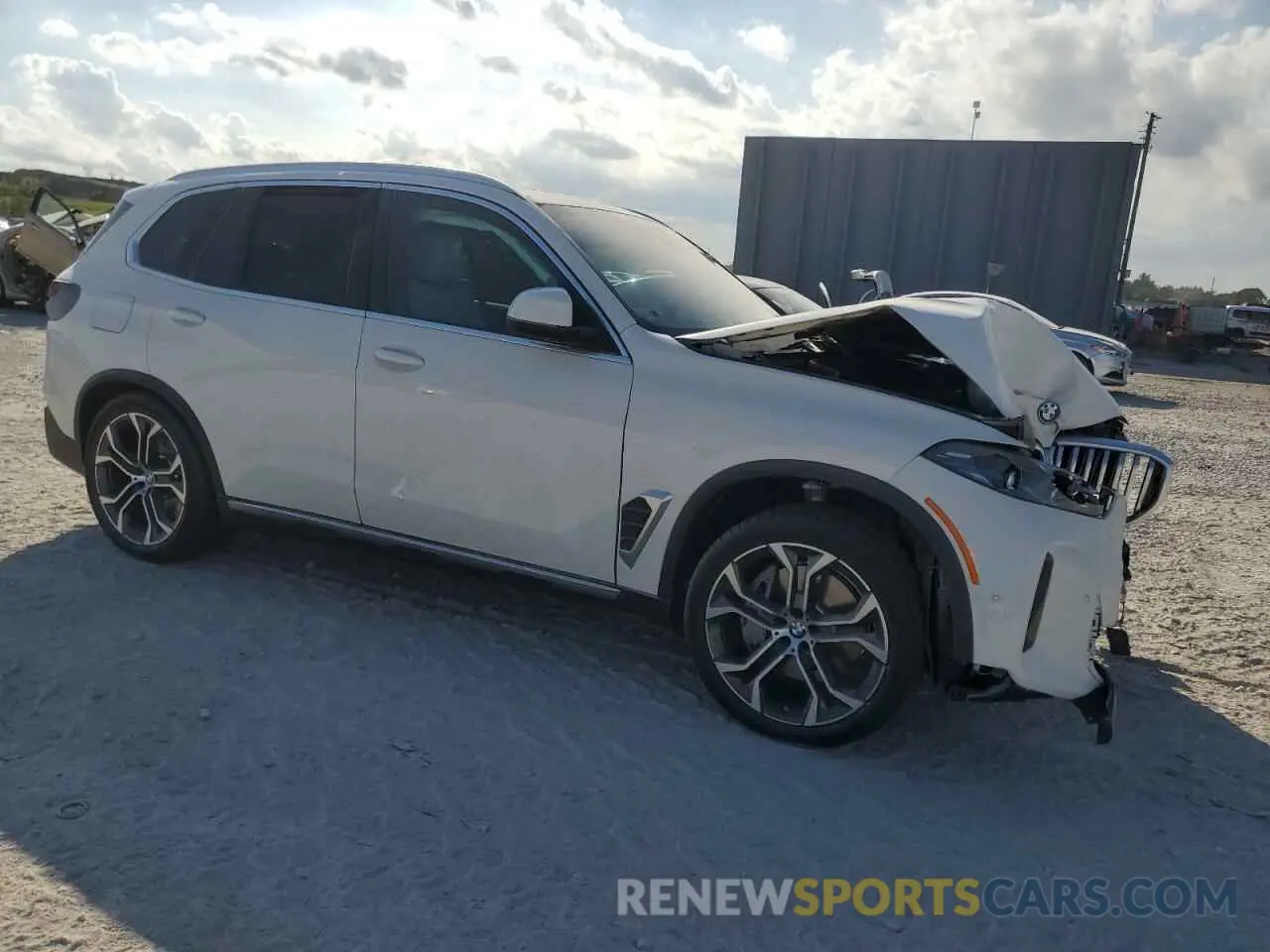 4 Photograph of a damaged car 5UX43EU02S9Y99733 BMW X5 2025