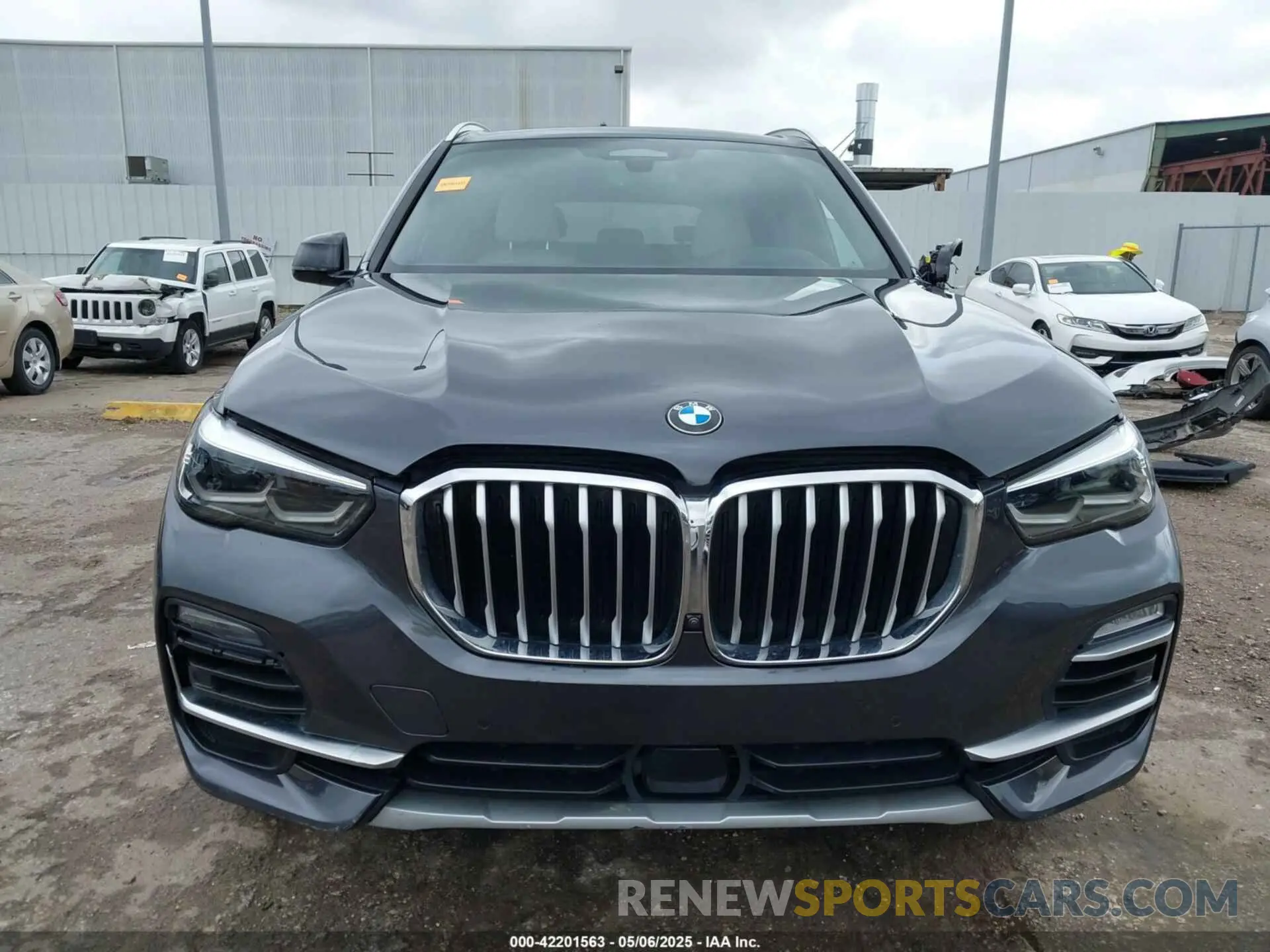 13 Фотография поврежденного автомобиля 5UXTA6C02M9F88978 BMW X5 PHEV 2021