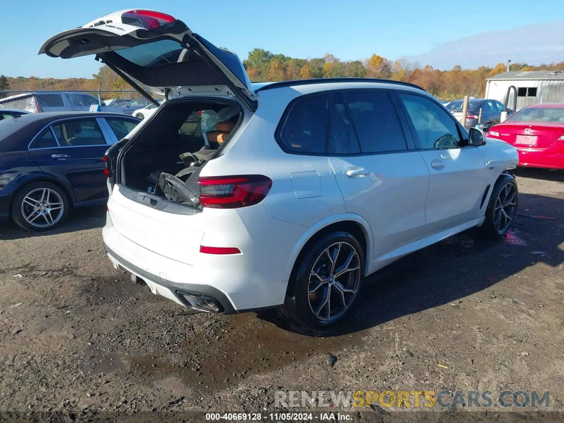 4 Photograph of a damaged car 5UXTA6C01P9P91992 BMW X5 PHEV 2023