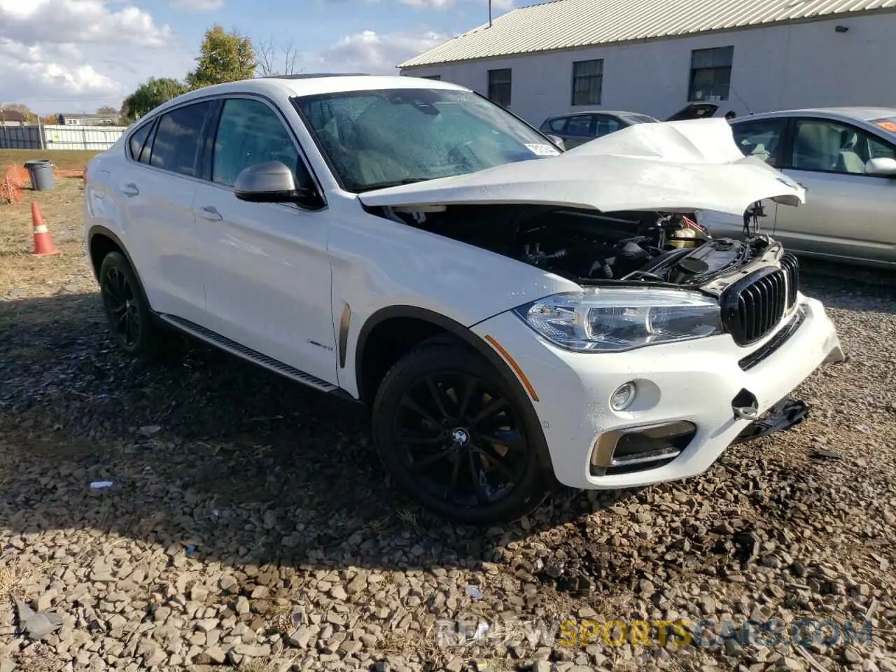 4 Photograph of a damaged car 5UXKU2C54K0Z65848 BMW X6 2019