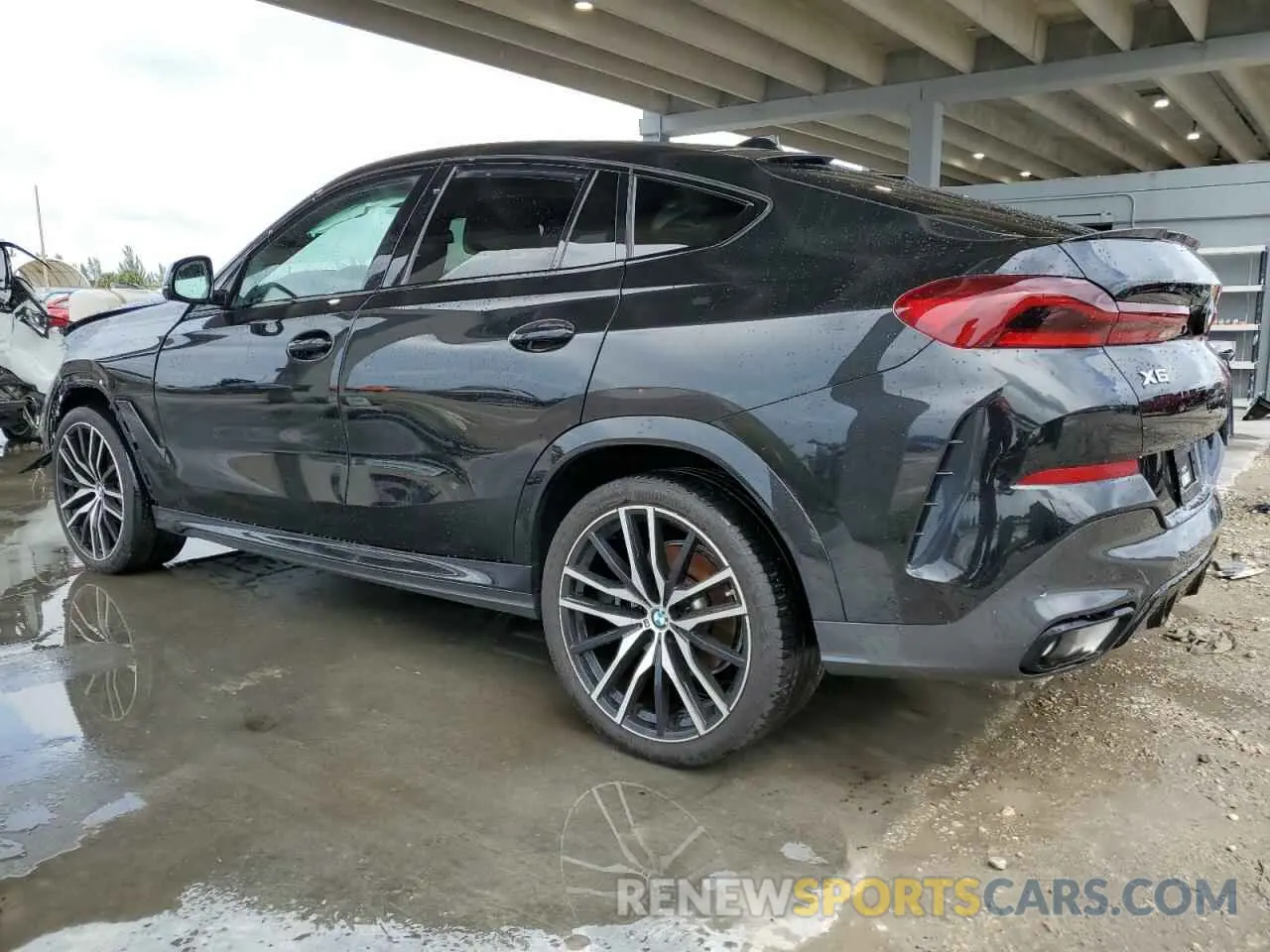 2 Photograph of a damaged car 5UXCY6C06P9P39303 BMW X6 2023