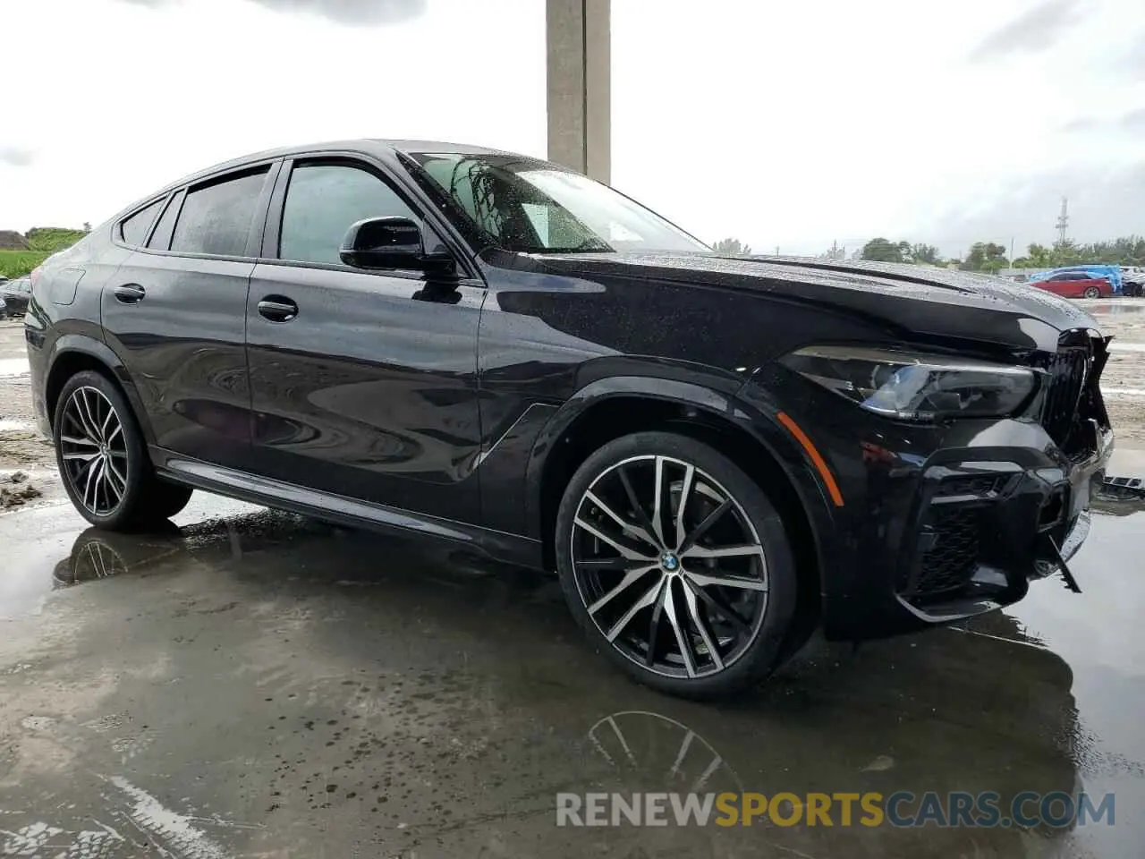 4 Photograph of a damaged car 5UXCY6C06P9P39303 BMW X6 2023