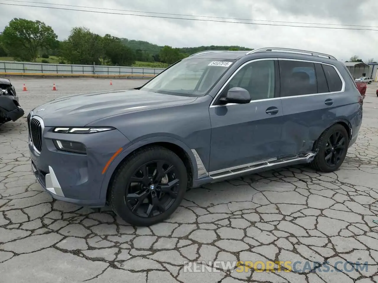 1 Photograph of a damaged car 5UX23EM08P9N85017 BMW X7 2023