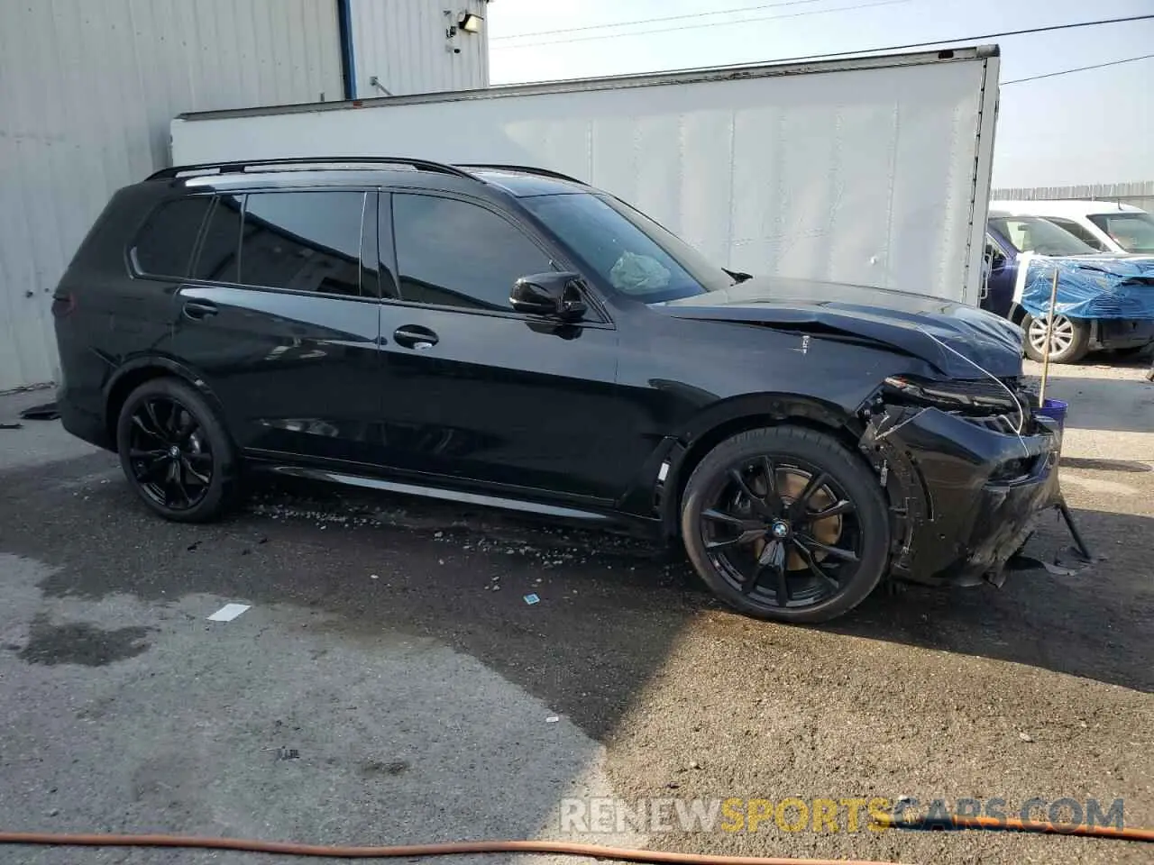 4 Photograph of a damaged car 5UX33EM02S9X77322 BMW X7 M60I 2025