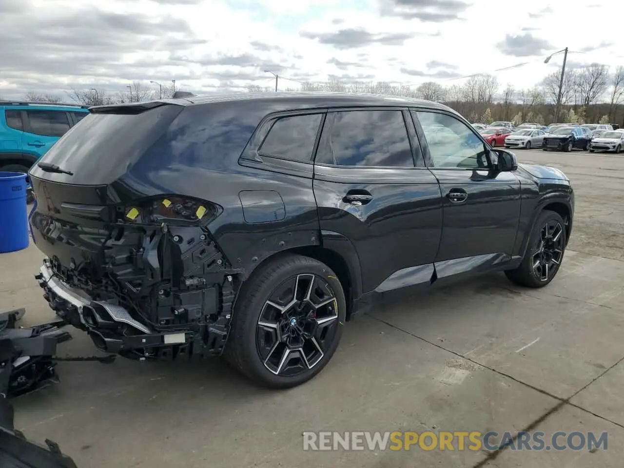 3 Photograph of a damaged car 5YM23CS06P9S62603 BMW XM 2023