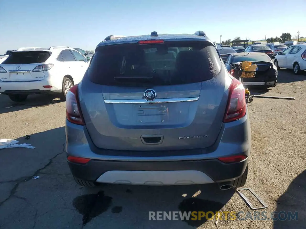 6 Photograph of a damaged car KL4CJASB2KB890405 BUICK ENCORE 2019