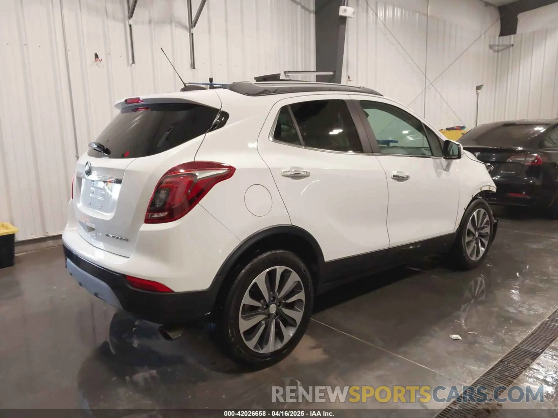4 Photograph of a damaged car KL4CJCSMXKB840512 BUICK ENCORE 2019