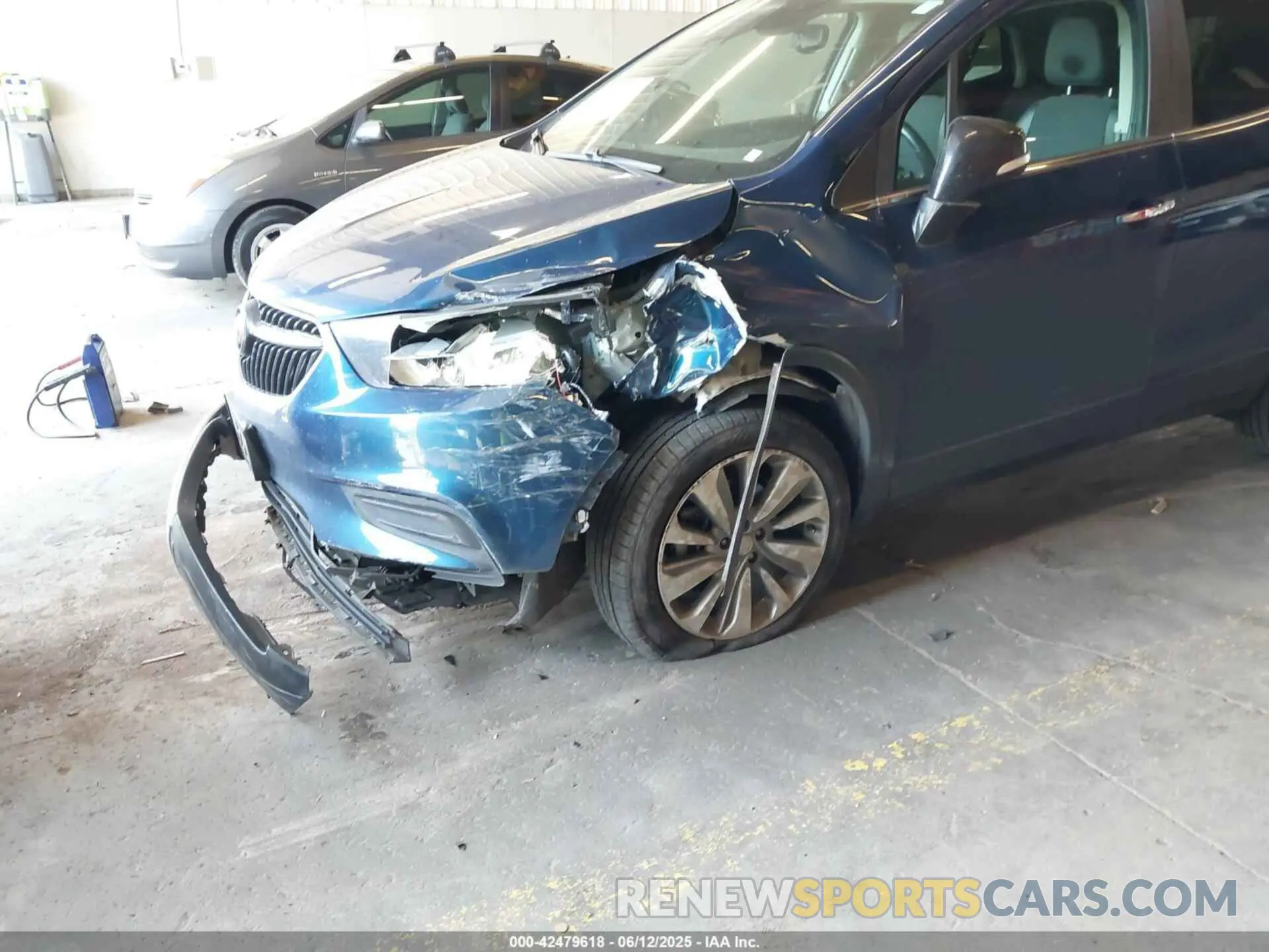 6 Photograph of a damaged car KL4CJESB2KB831135 BUICK ENCORE 2019