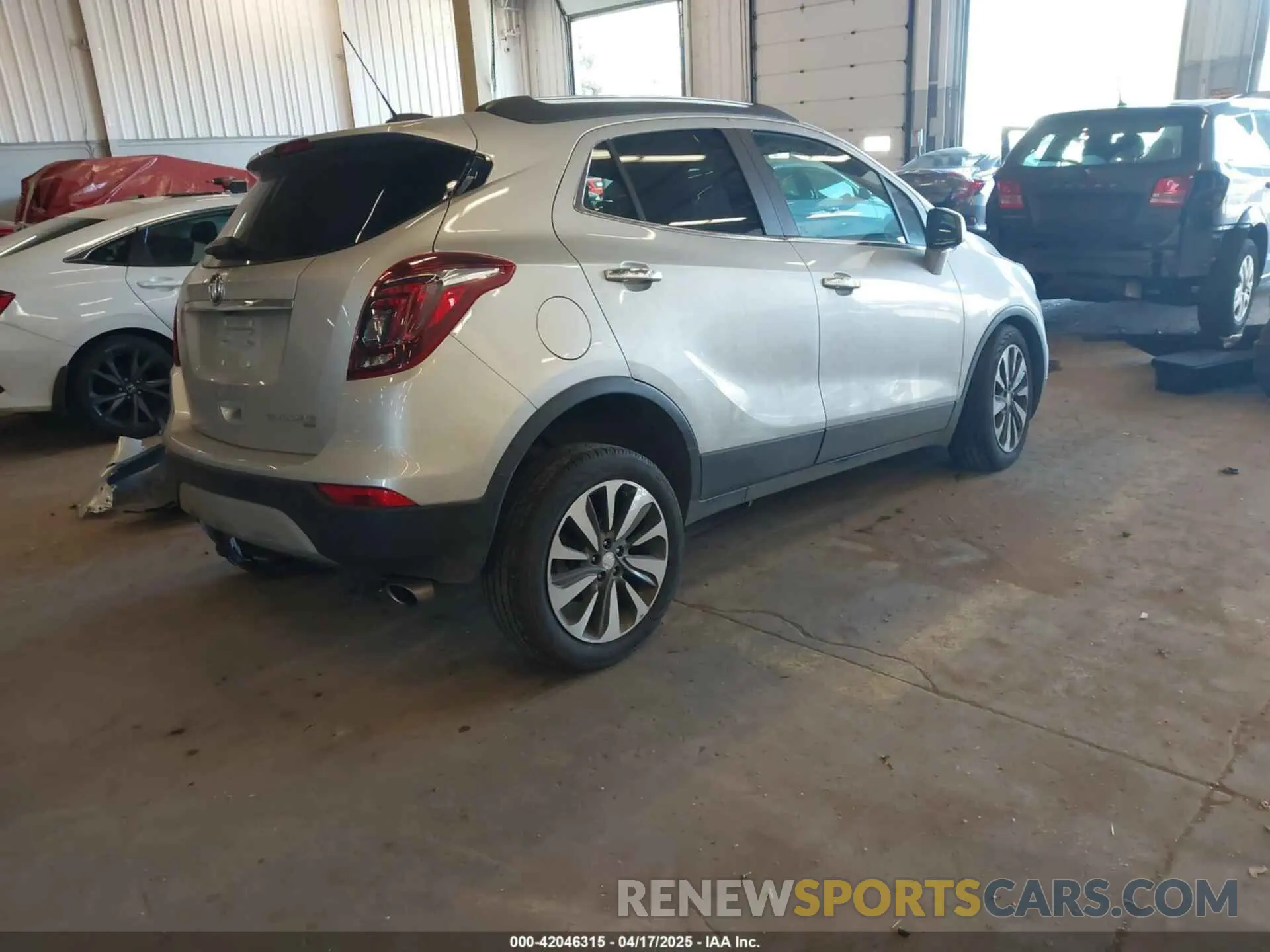4 Photograph of a damaged car KL4CJESM3NB560690 BUICK ENCORE 2022